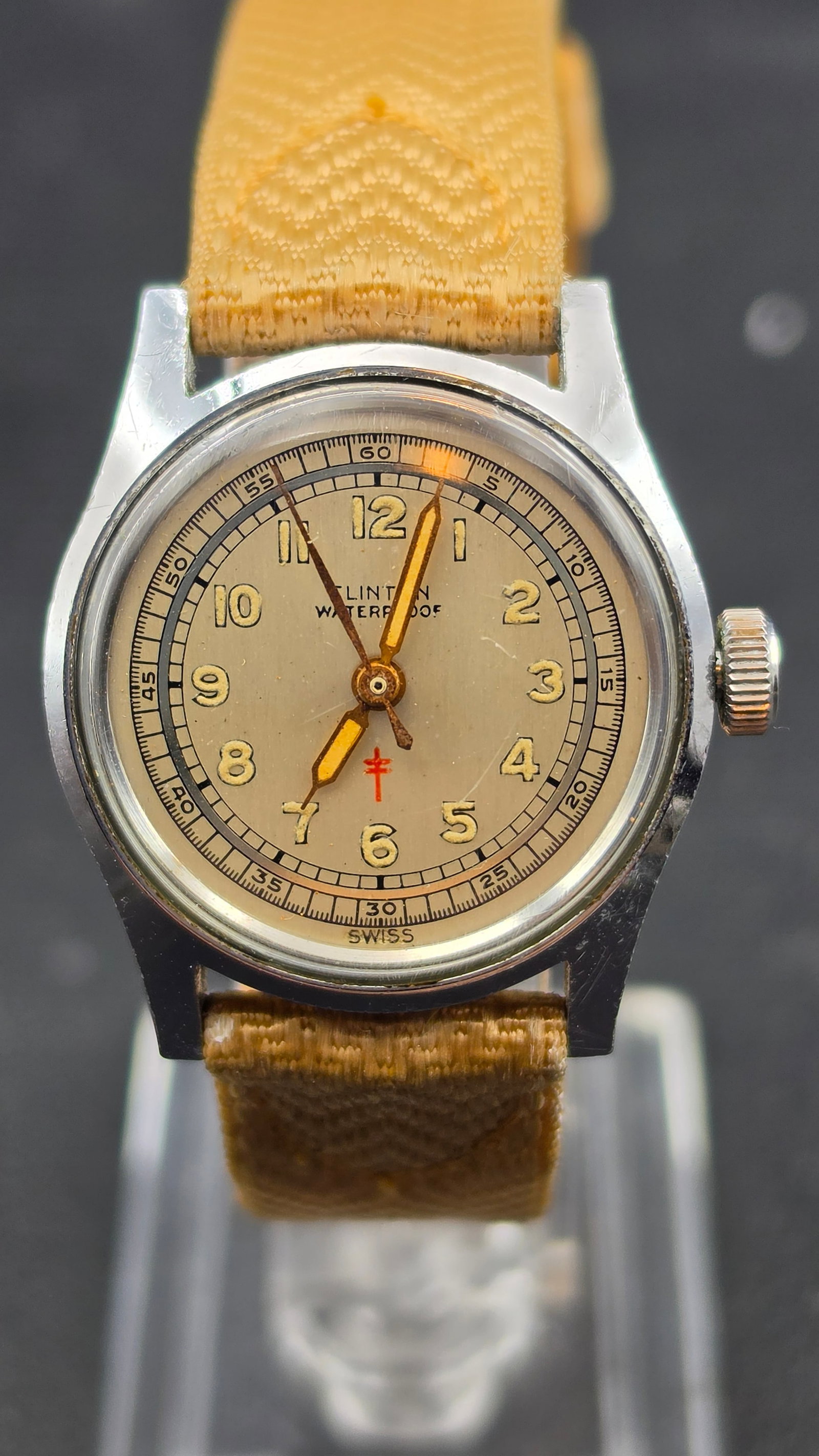 Vintage 1940s Clinton Watch Co Waterproof Military Style Watch 17 Jewels Swiss Movement Cross of Lor: This is a vintage men's wristwatch by the Clinton Watch Company, a Chicago based watch firm founded in 1922 by Hyman Wein, known for assembling quality Swiss movements into American designed watches. 