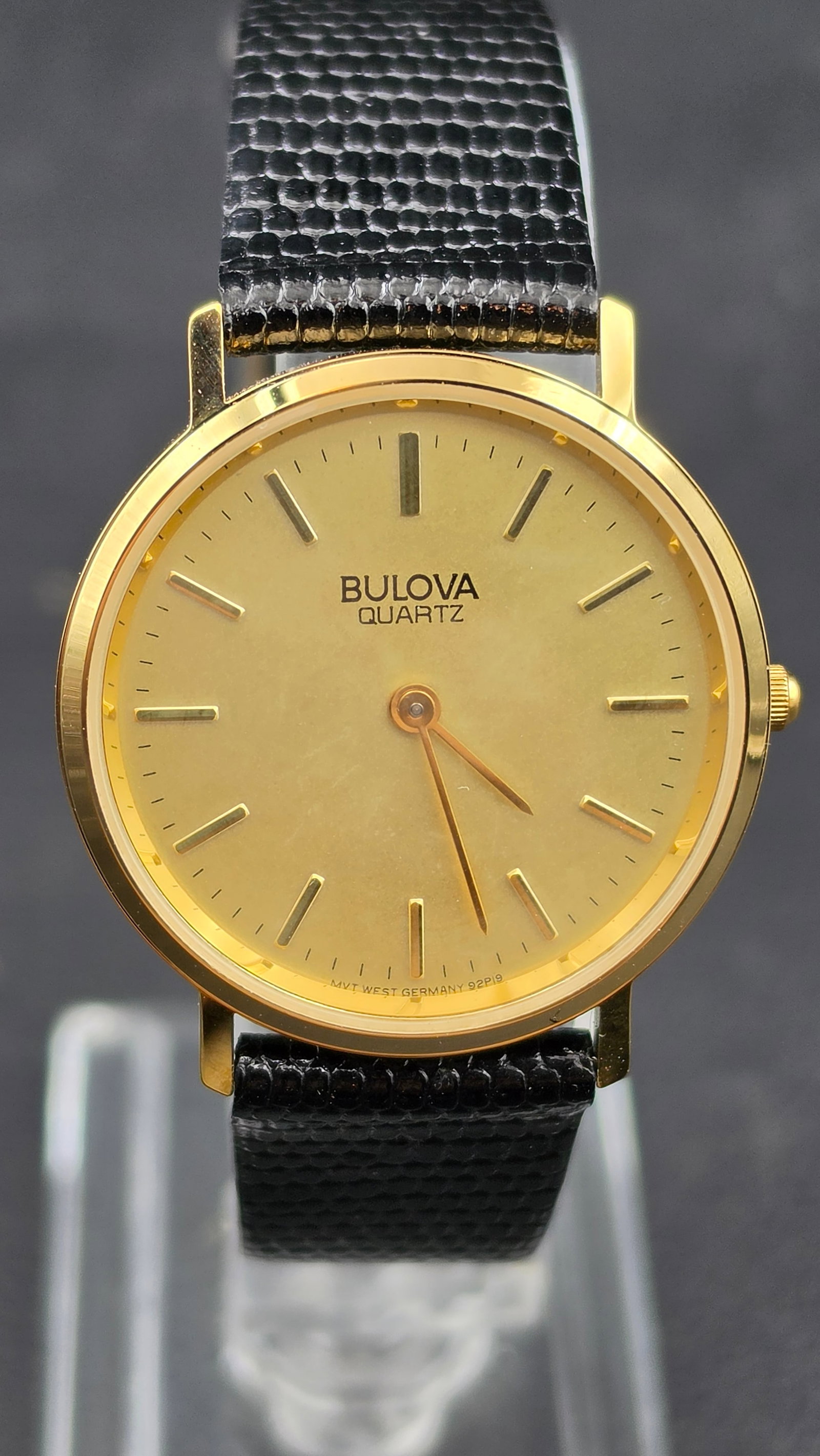 1980s Bulova Quartz Mens Dress Watch 92P19 Movement Gold Tone Case West Germany Movement New Old Sto