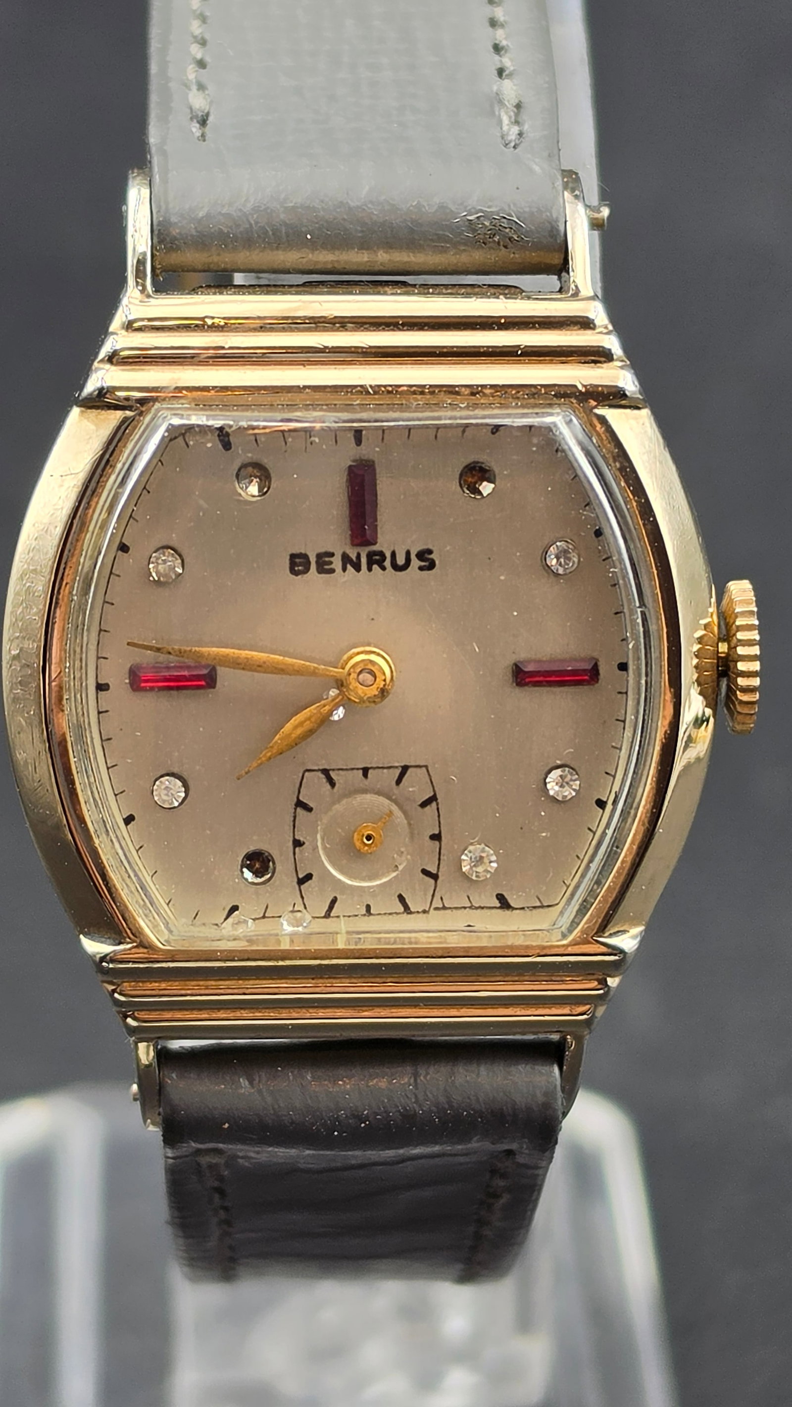 Benrus Art Deco Watch Model BB3 15 Jewel Rhinestone Dial Gold Filled Running: This is a vintage Art Deco Benrus dress watch, gold filled. The cushion-shaped case houses a dial signed Benrus, decorated with red baguette-cut stone markers at 12, 3, and 9, and clear rhinestone acc