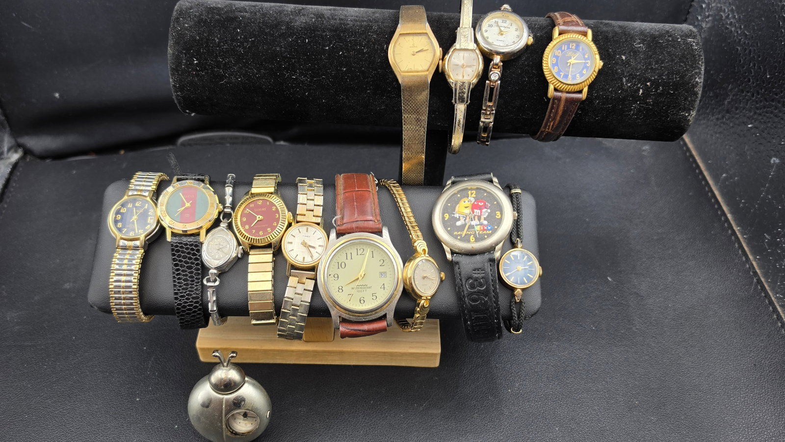 Vintage Ladies Watch Lot of 14 Timex Helbros Consul Gucci Jaclyn Smith and More: This lot includes approximately fourteen vintage and costume ladies wristwatches and novelty pieces. Identified brands and pieces include: a Timex watch with a cushion-shaped case, white dial, and two