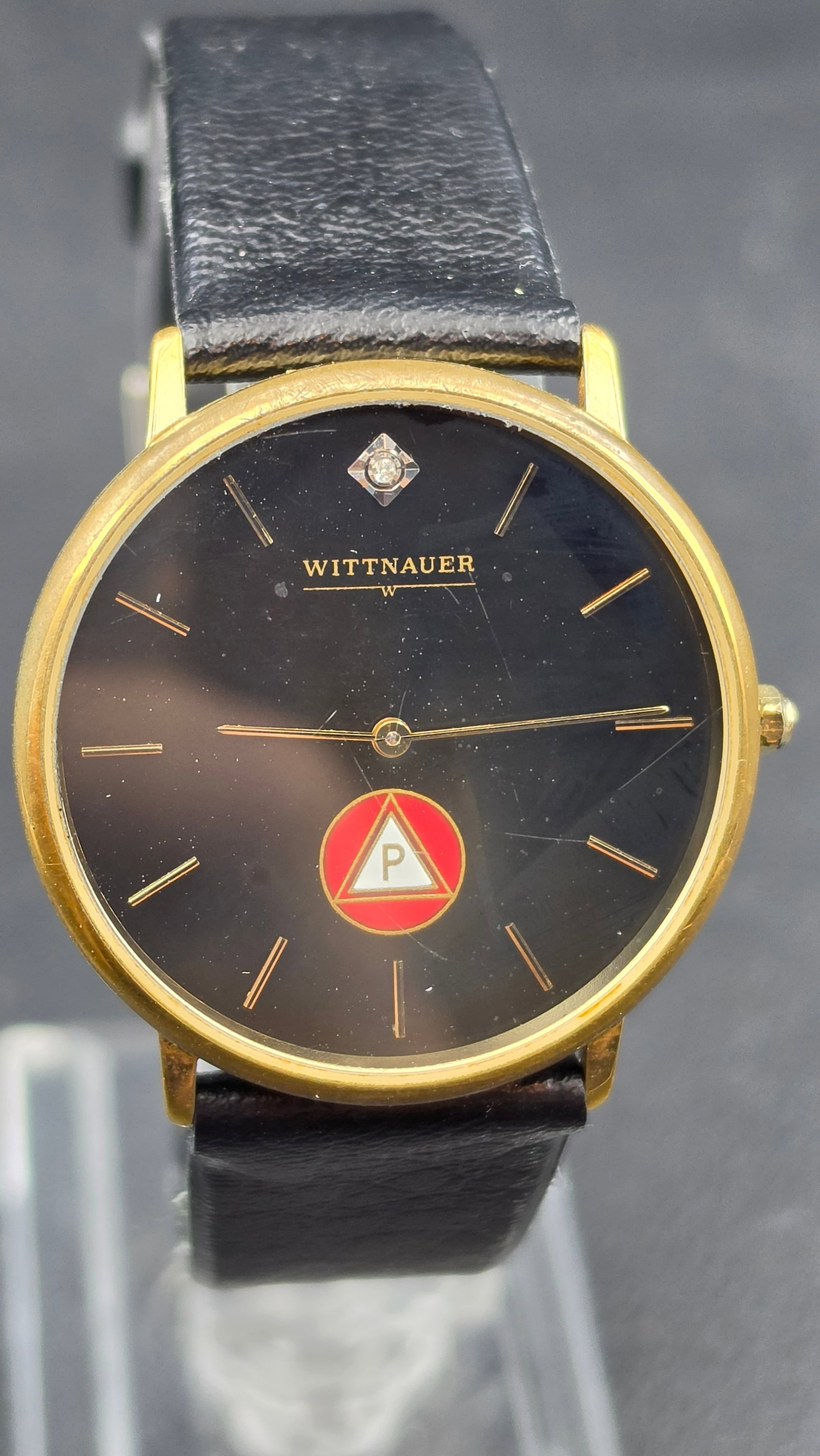 Vintage Wittnauer Mens Dress Watch Black Dial Diamond Marker Masonic Emblem Gold Tone 33mm: This is a vintage Wittnauer dress watch in a gold tone base metal case measuring approximately 33.3mm across excluding the crown, with a case back stamped BASE METAL. The black dial is signed WITTNAUE