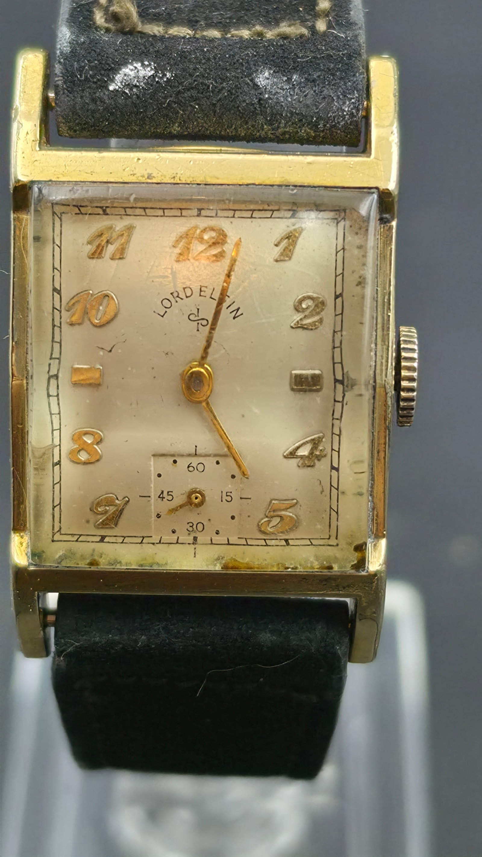 Vintage 1950s Lord Elgin 21 Jewel 14K Gold Filled Sub Second Mens Watch: Vintage Lord Elgin manual wind wristwatch with a rectangular 14K gold filled case and a sub-seconds subdial at 6 o'clock featuring its own 15/30/45/60 printed minute track. Cream dial signed LORD ELGI