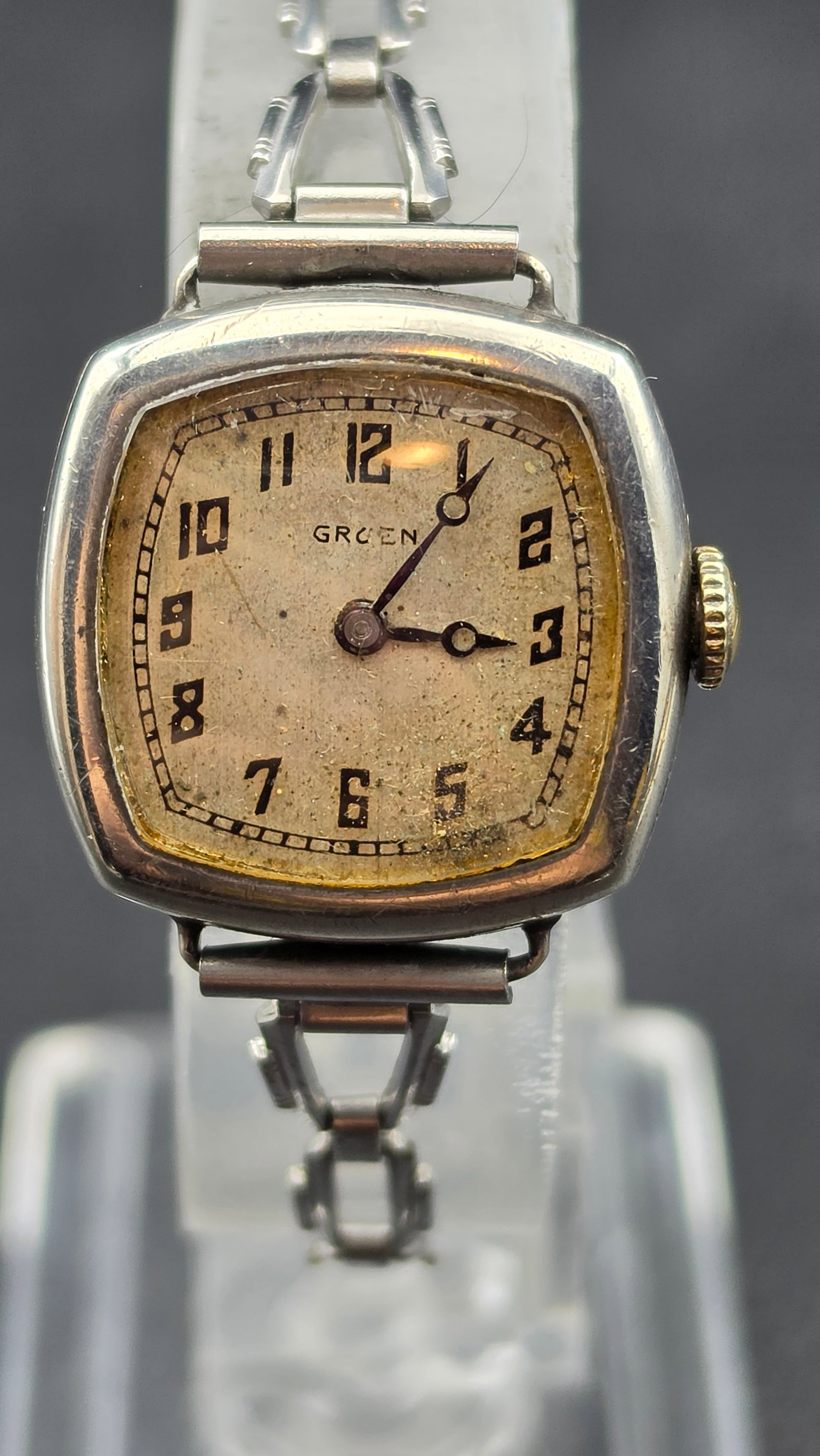 Gruen Watch Co Suisse 1920s Ladies Cushion Case Sterling Silver 0.900 17 Jewel Wristwatch: This is a 1920s Gruen Watch Co. Suisse ladies wristwatch in a cushion-shaped 0.900 silver case, stamped case number 129, measuring approximately 21.1mm wide excluding the crown. The manual-wind moveme
