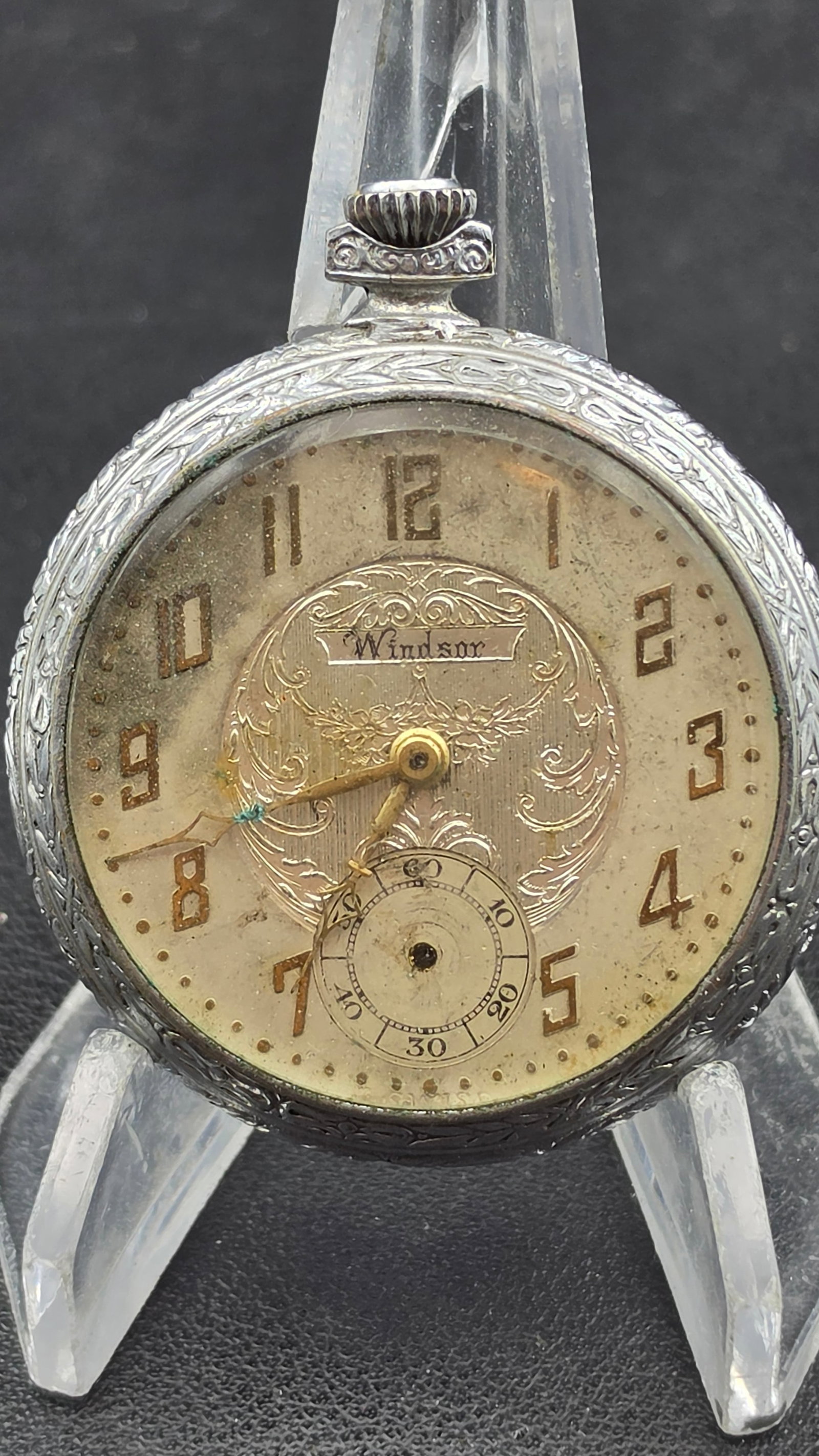 Jagot Watch Co Windsor Pocket Watch, Swiss 6 Jewel, Engraved Case, 1920s: This antique Swiss pocket watch is signed Windsor on the silvered dial, which features an engraved scroll cartouche, Arabic numerals, and a subsidiary seconds dial at 6 o'clock. The movement is signed