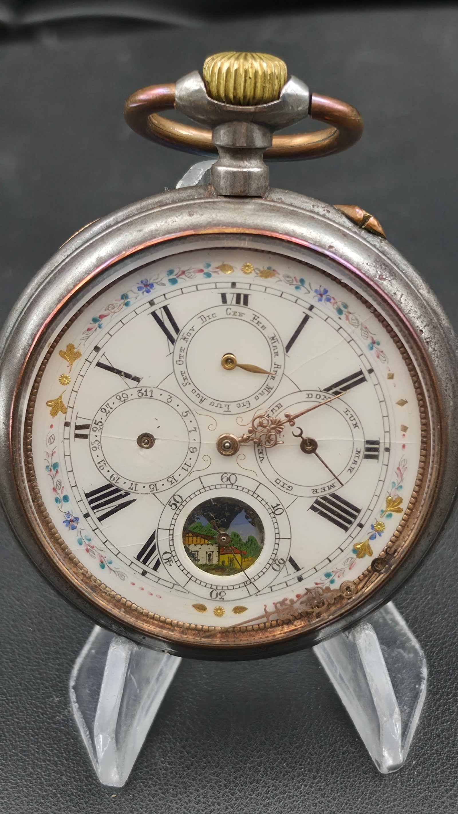 Swiss Triple Calendar Pocket Watch, Steel Case, Painted Scene Sub-Dial, Oversized 64mm: This is a Swiss triple calendar (day, date, month) open face pocket watch in a nickel steel case marked Acier Garantie (guaranteed steel), case serial number 4764699. The white enamel dial features da
