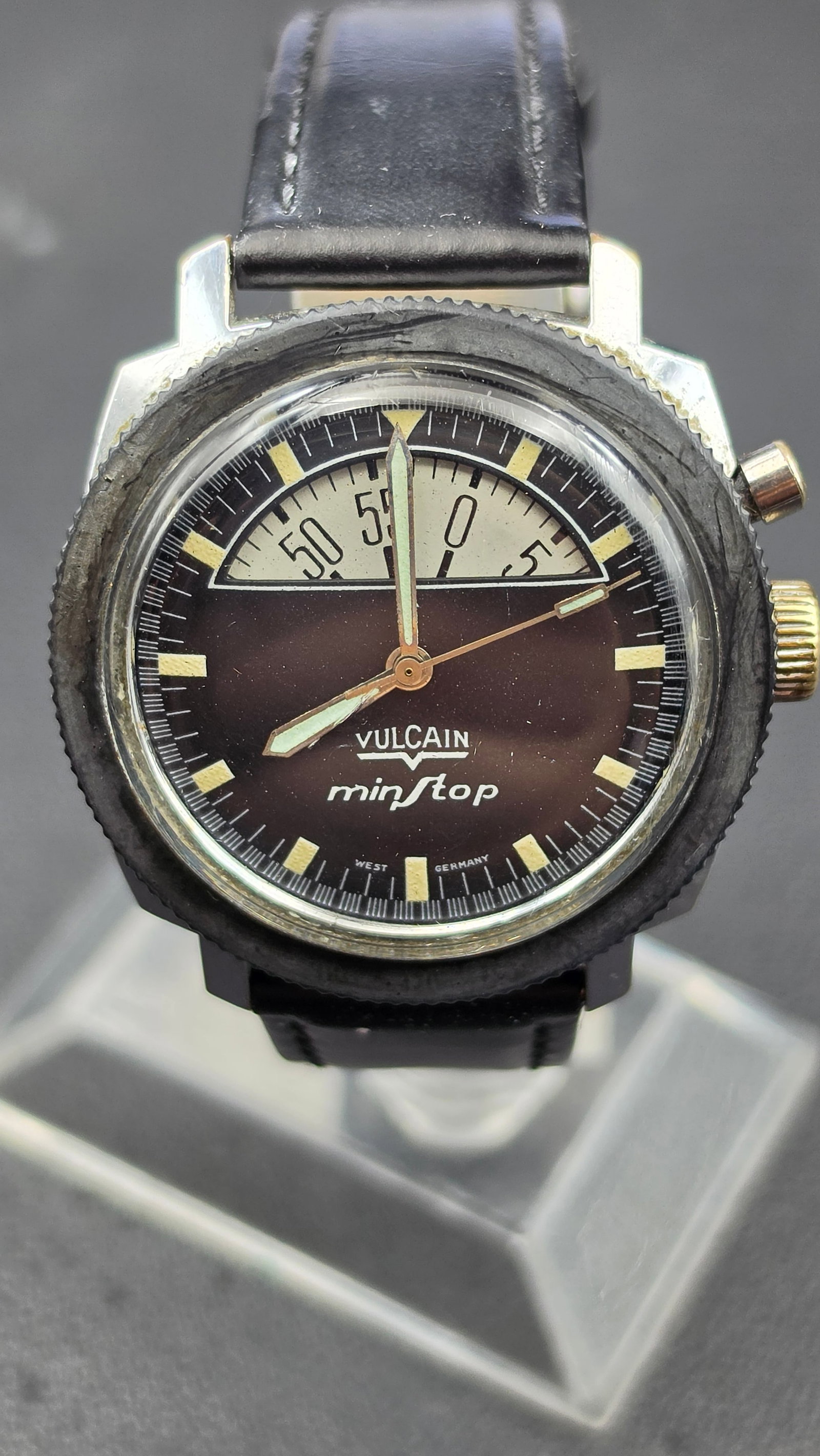 Vintage 1960s Vulcain Minstop Parking Meter Watch H88.101 17 Jewel West Germany Running: This Vulcain Minstop, nicknamed the parking meter watch for its half-moon 60 minute countdown register, has a dial signed Vulcain, Minstop, and West Germany, with a two pusher configuration on the cas