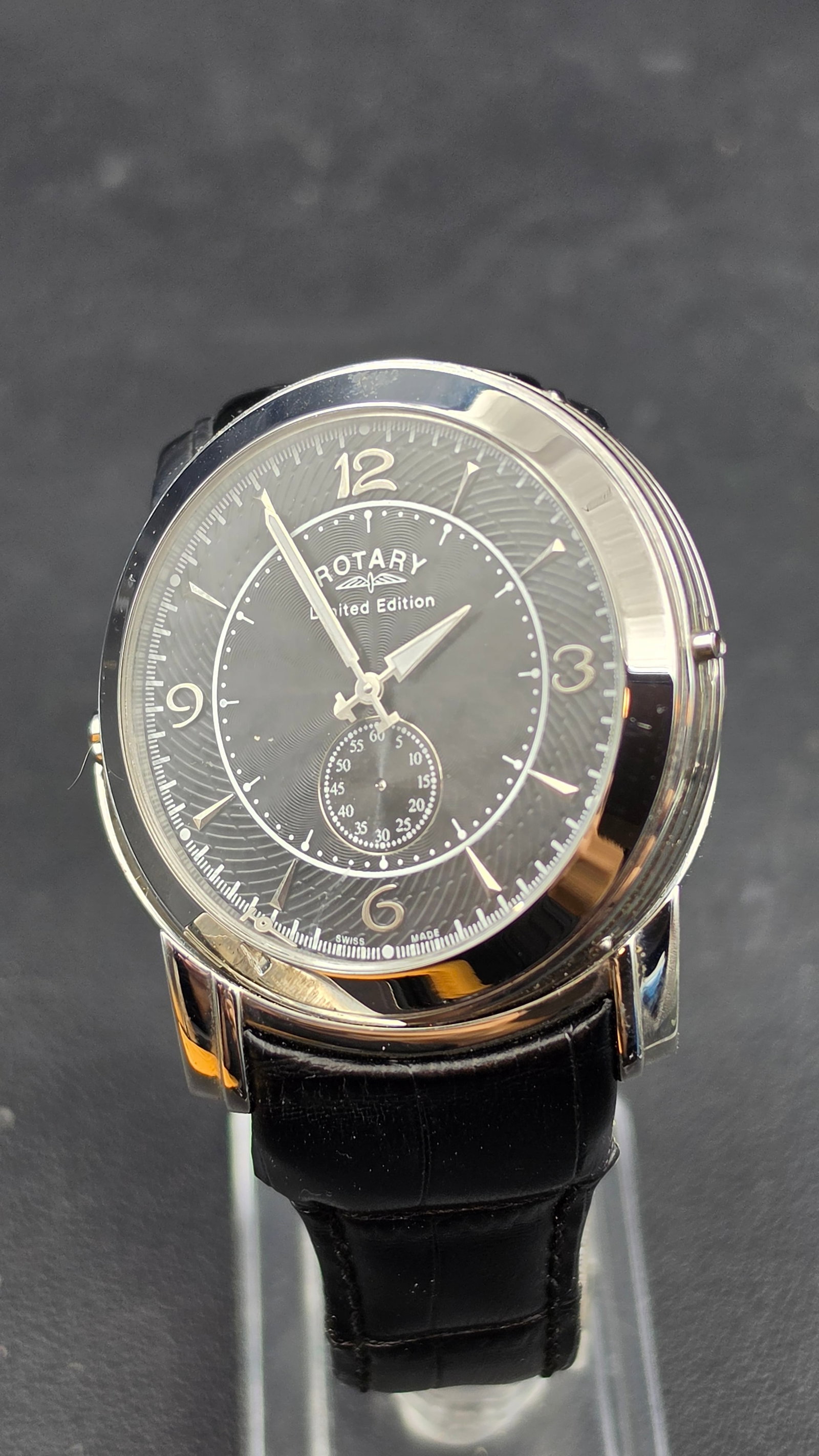 Rotary Revelation Limited Edition Dual-Dial Reversible Swiss Watch, #0025/1000: This Rotary Revelation is a reversible two-sided watch housing two separate Swiss quartz movements in one case, allowing the wearer to flip between a cream dial with Roman numerals and date window, an