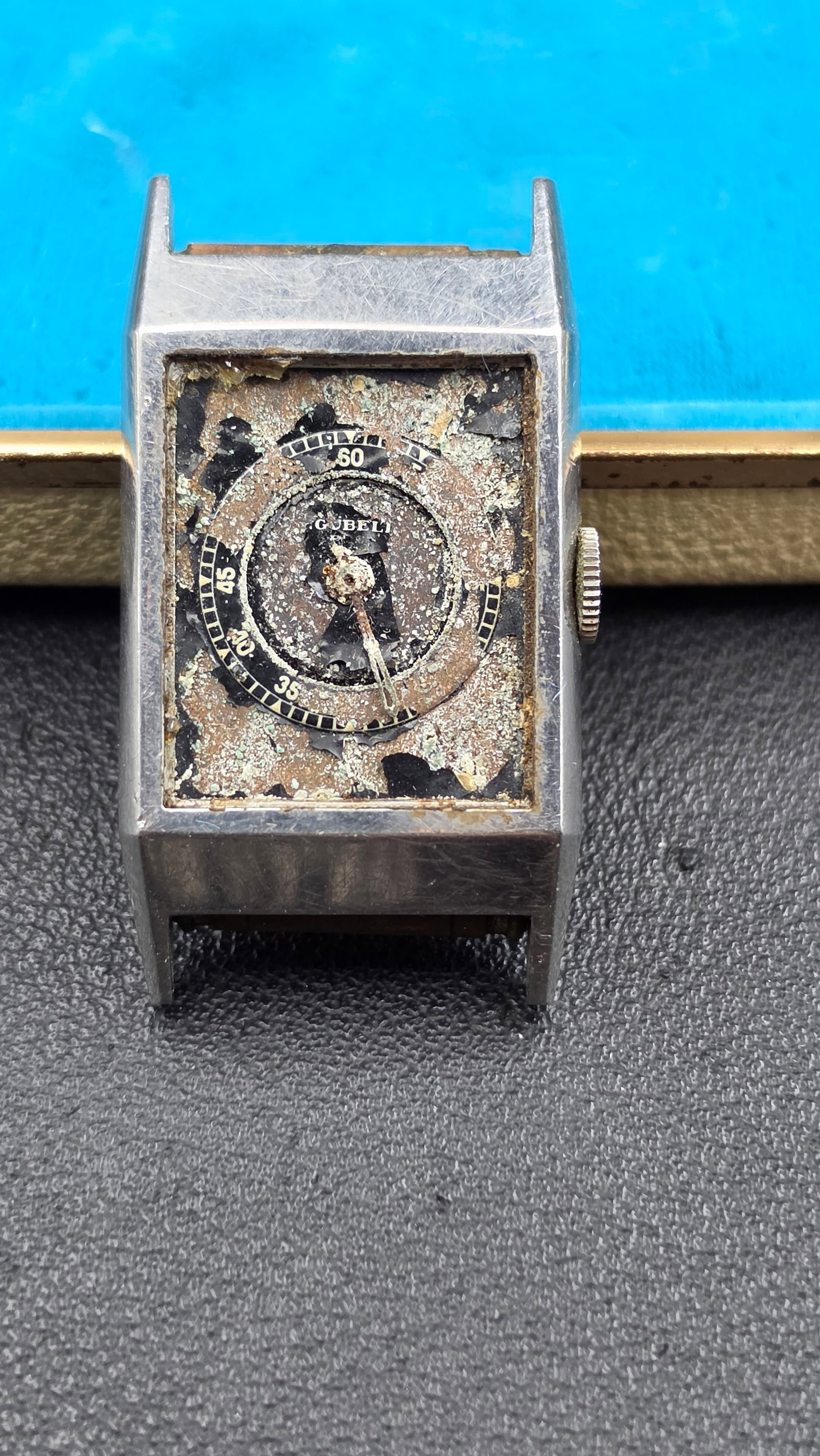 Vintage 1930s E Gübelin Art Deco Watch RUNNING Jaeger-LeCoultre Cal 11UO Staybrite Steel: Up for auction is a rare, historically significant 1930s Art Deco rectangular wristwatch retailed by the luxury Swiss house E. Gübelin. This timepiece houses a highly desirable, fully running movemen