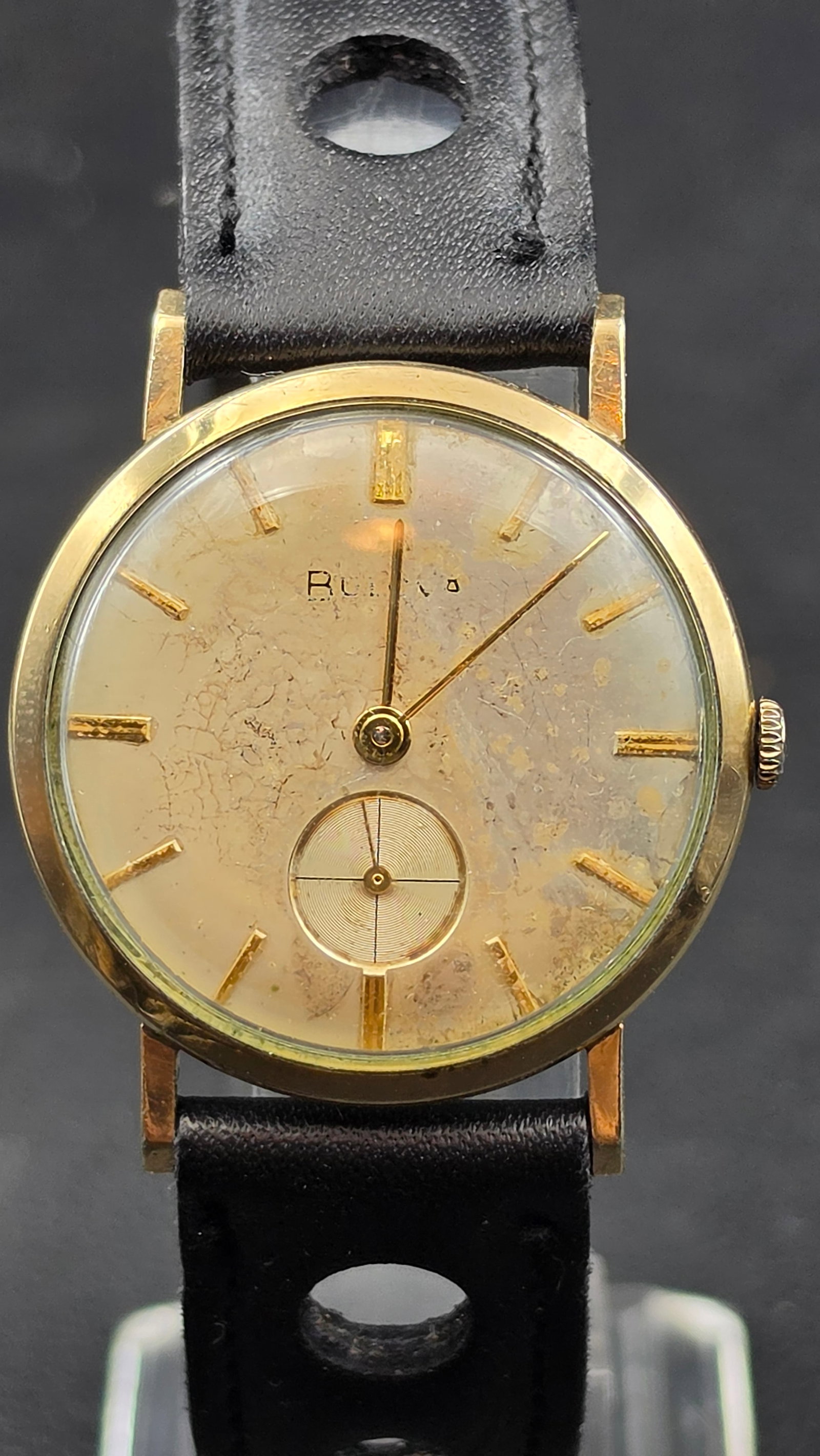 Vintage Bulova Dress Watch 11AF 17 Jewel 10K Rolled Gold Plate Running: This is a vintage Bulova manual wind dress wristwatch in a 10K rolled gold plate case, serial E594339. The gilt dial is signed Bulova with applied baton markers and a subsidiary seconds dial at 6 o'cl