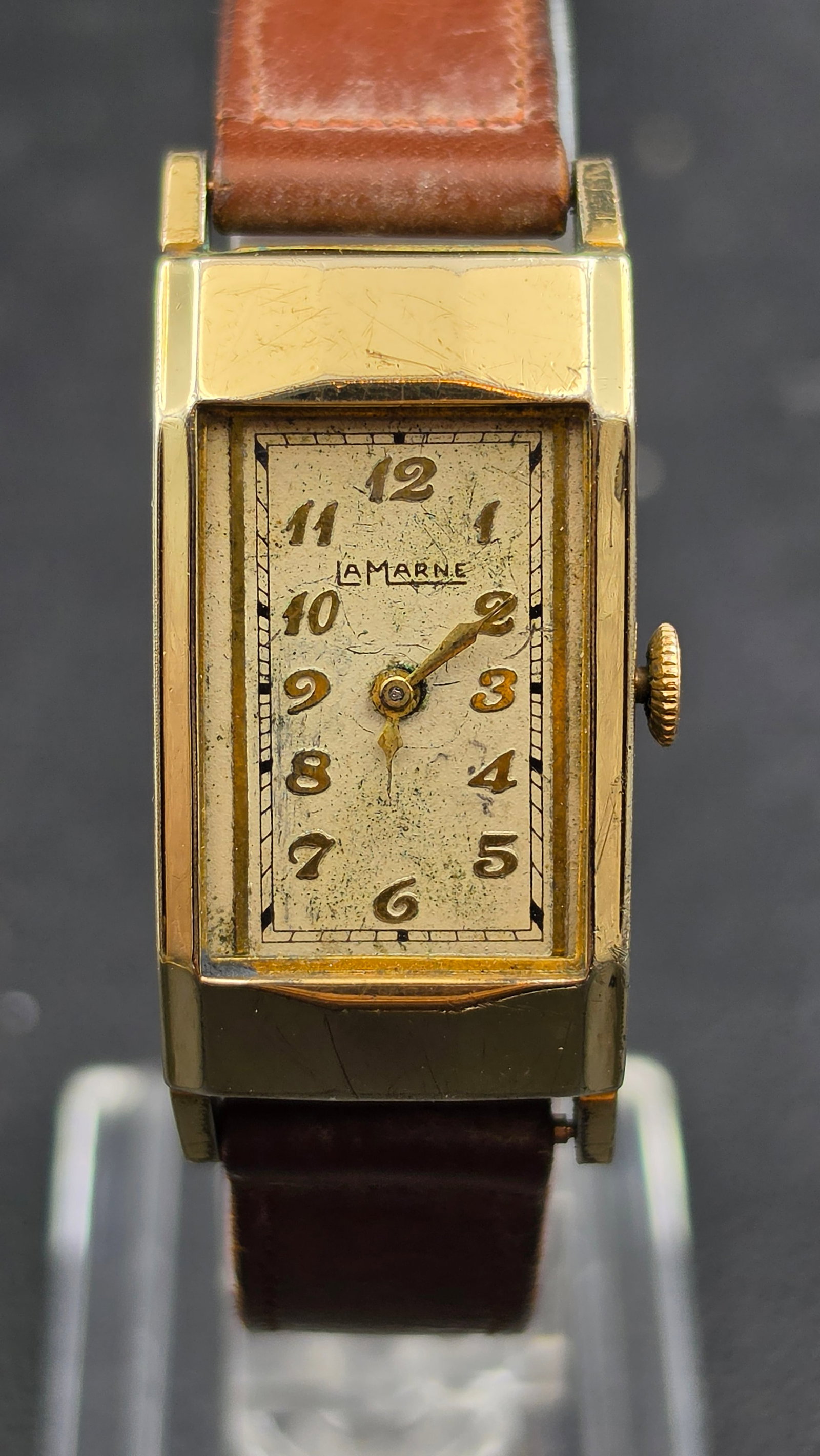 Vintage 1930s LaMarne Art Deco 15 Jewel Swiss Wristwatch Running: This vintage Art Deco wristwatch has a rectangular case with cut corners and fluted lugs, and a dial signed LaMarne with gold Arabic numerals and a railroad-style minute track. The movement is signed 