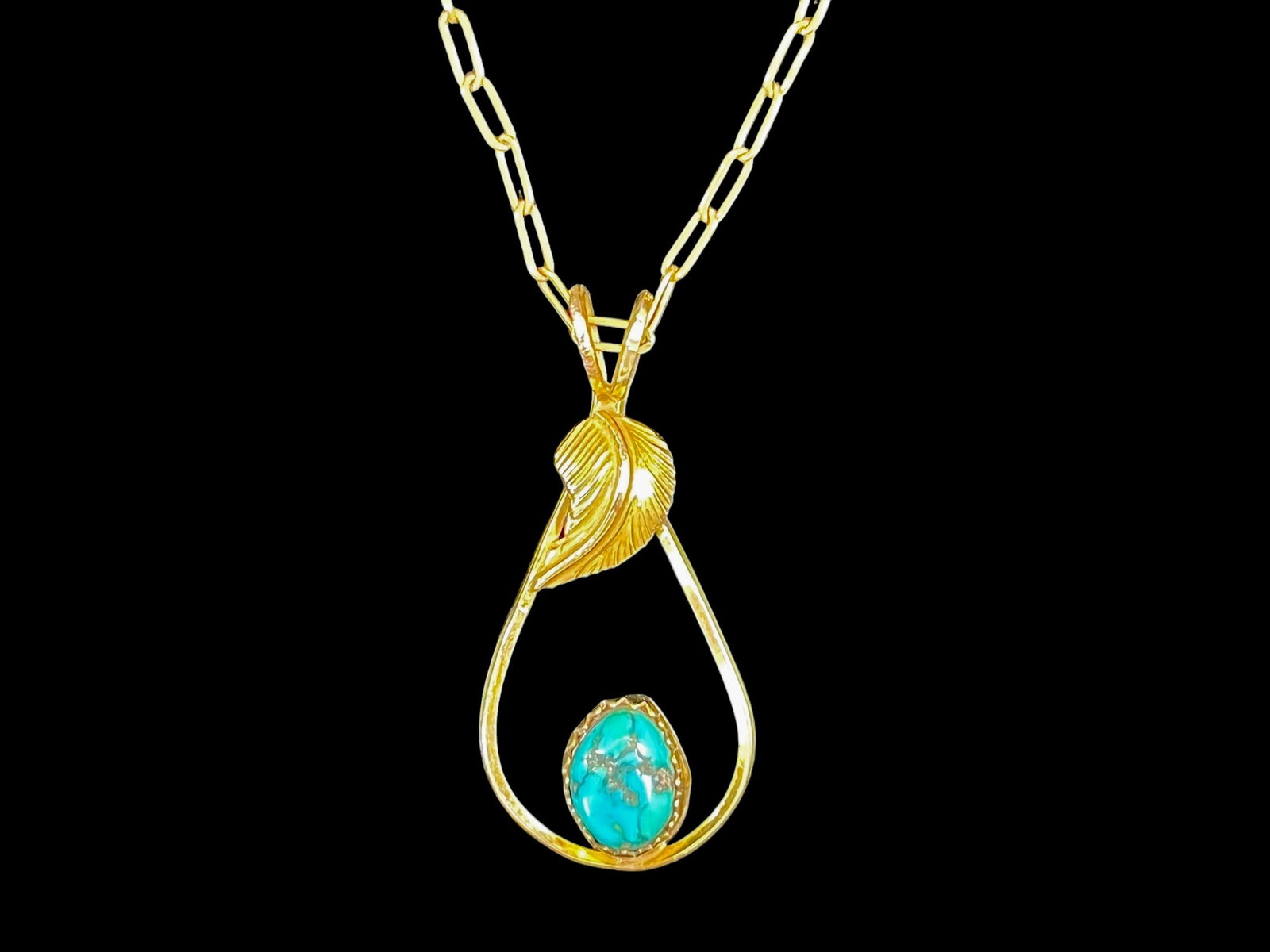 3g/10k Signed Southwestern Turquoise Leaf Necklace: 3g Turquoise Leaf Pendant Necklace, Marked 12K/20K Brand/Model: Hallmark, clasp stamped approximately “20K” with extra characters too worn to read; pendant reverse bears a worn mark reading ap