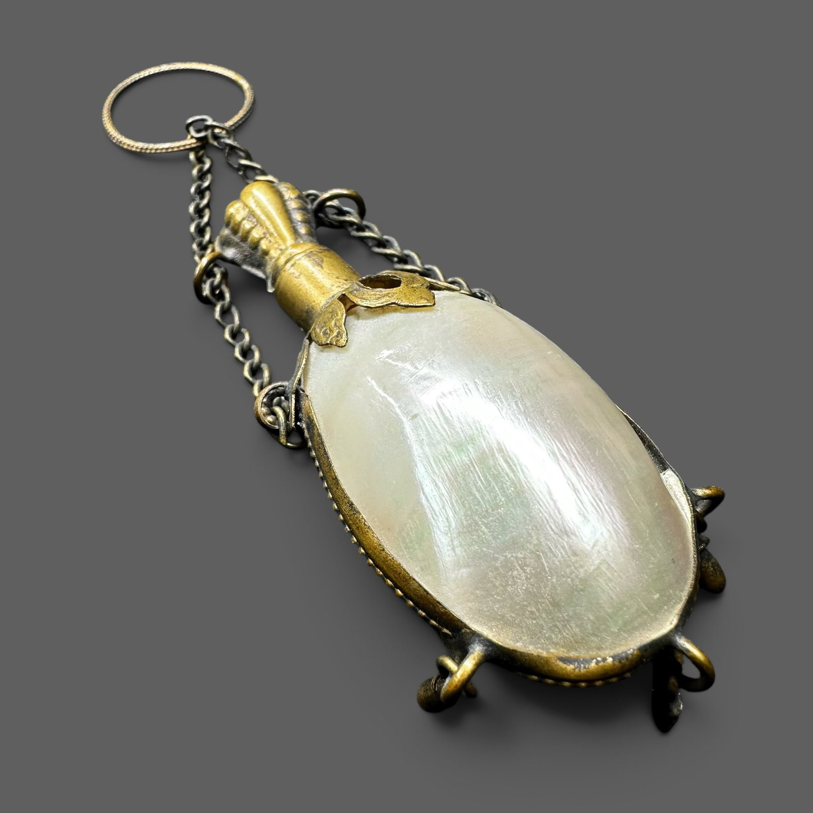 Vintage Brass Mother Of Pearl Perfume Bottle Chatelaine: Vintage Brass Mother Of Pearl Perfume Bottle Chatelaine:Brand/Model: No hallmark. Unidentified maker.Manufacturer Location: Not marked.Year Produced: Early to mid-20th century.Specs/Description: Vinta