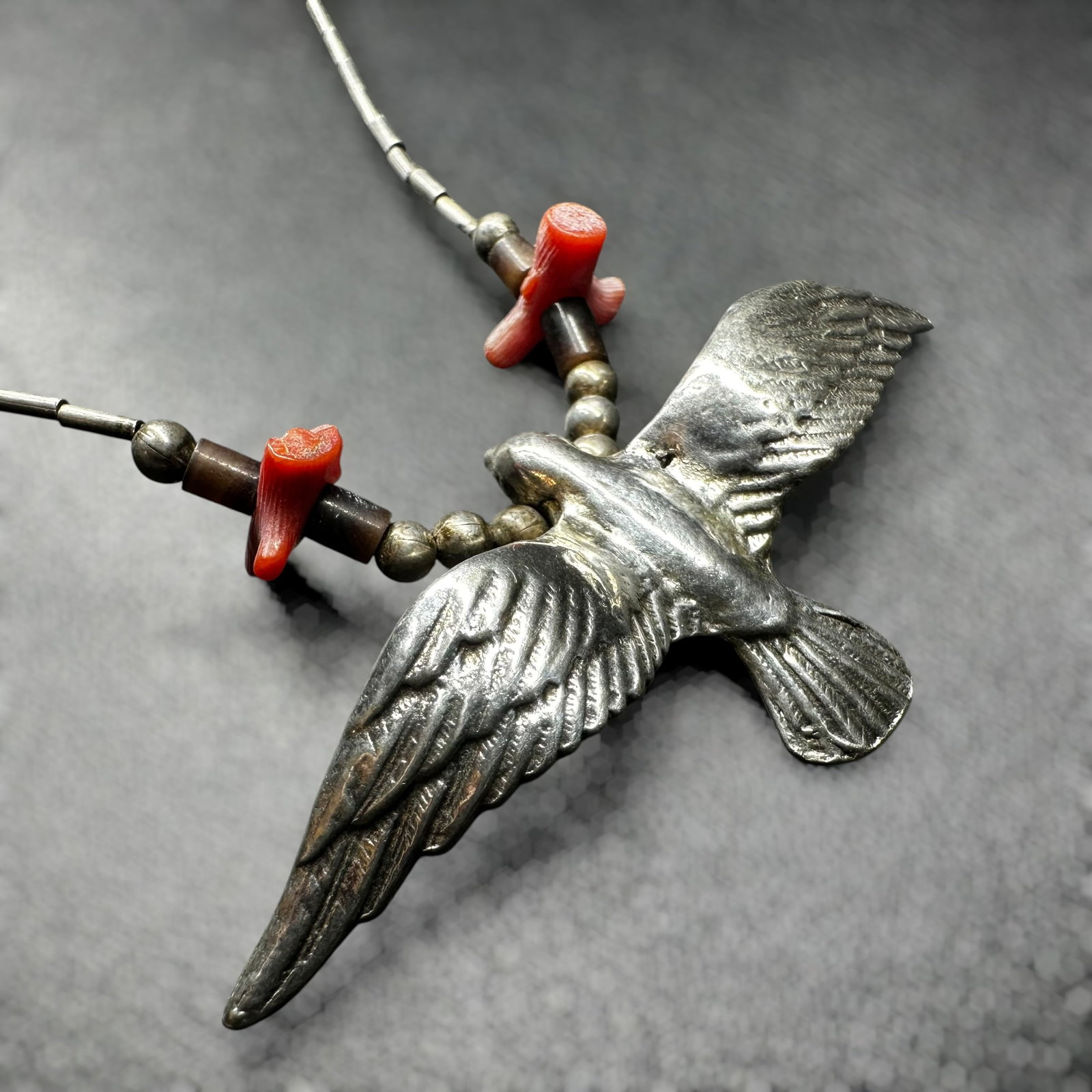 14"/14g Southwestern Sterling Silver Coral Eagle Necklace: 14"/14g Southwestern Sterling Silver Coral Eagle Necklace:Brand/Model: No hallmark. Unidentified artisan/shop.Manufacturer Location: Not marked.Year Produced: Unknown.Specs/Description: Southwestern S