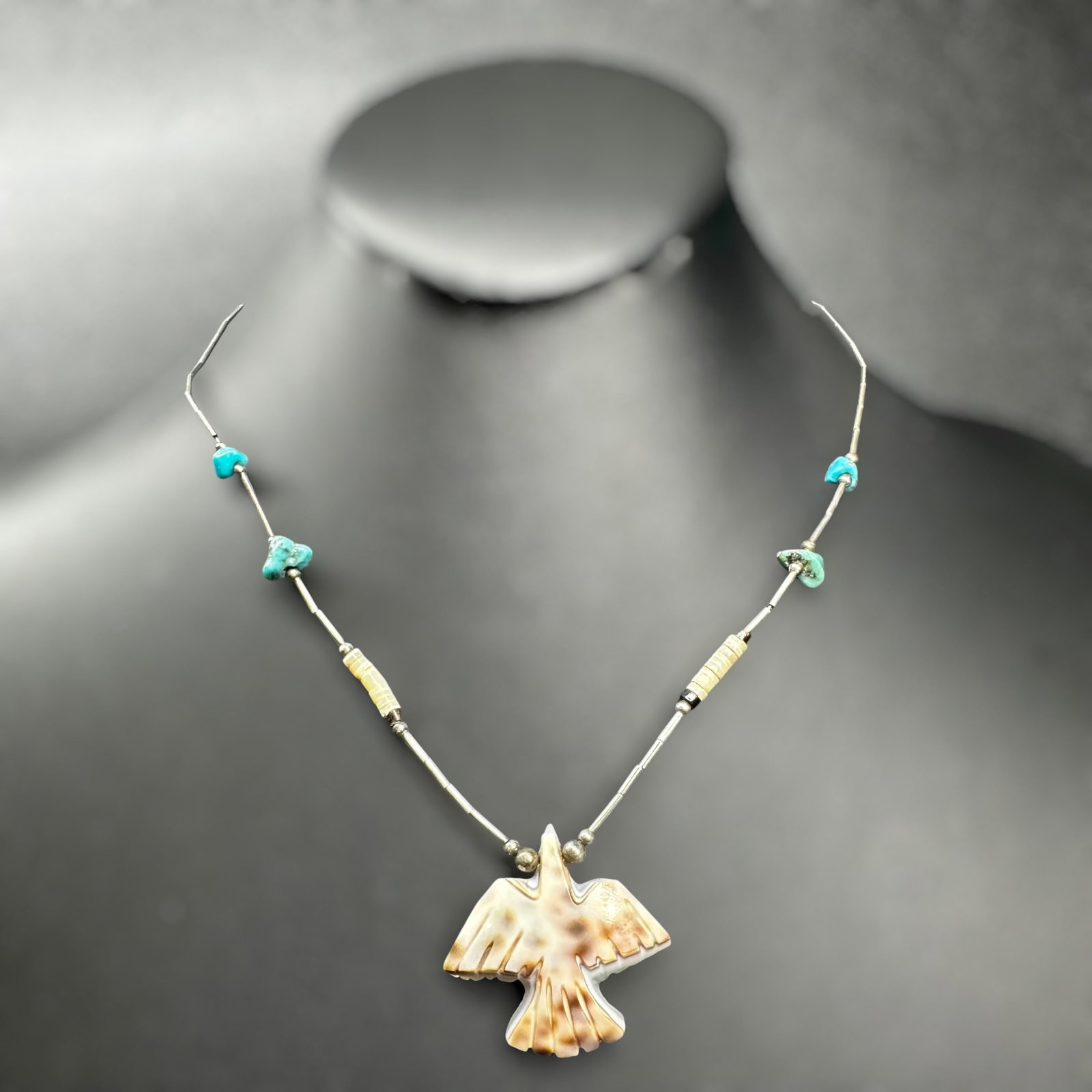 16" Southwestern Turquoise Carved Shell Bird Pendant Necklace: 18" Southwestern Turquoise Carved Shell Bird Pendant Necklace:Brand/Model: No hallmark. Unidentified artisan/shop.Manufacturer Location: Not marked.Year Produced: Unknown.Specs/Description: Southweste