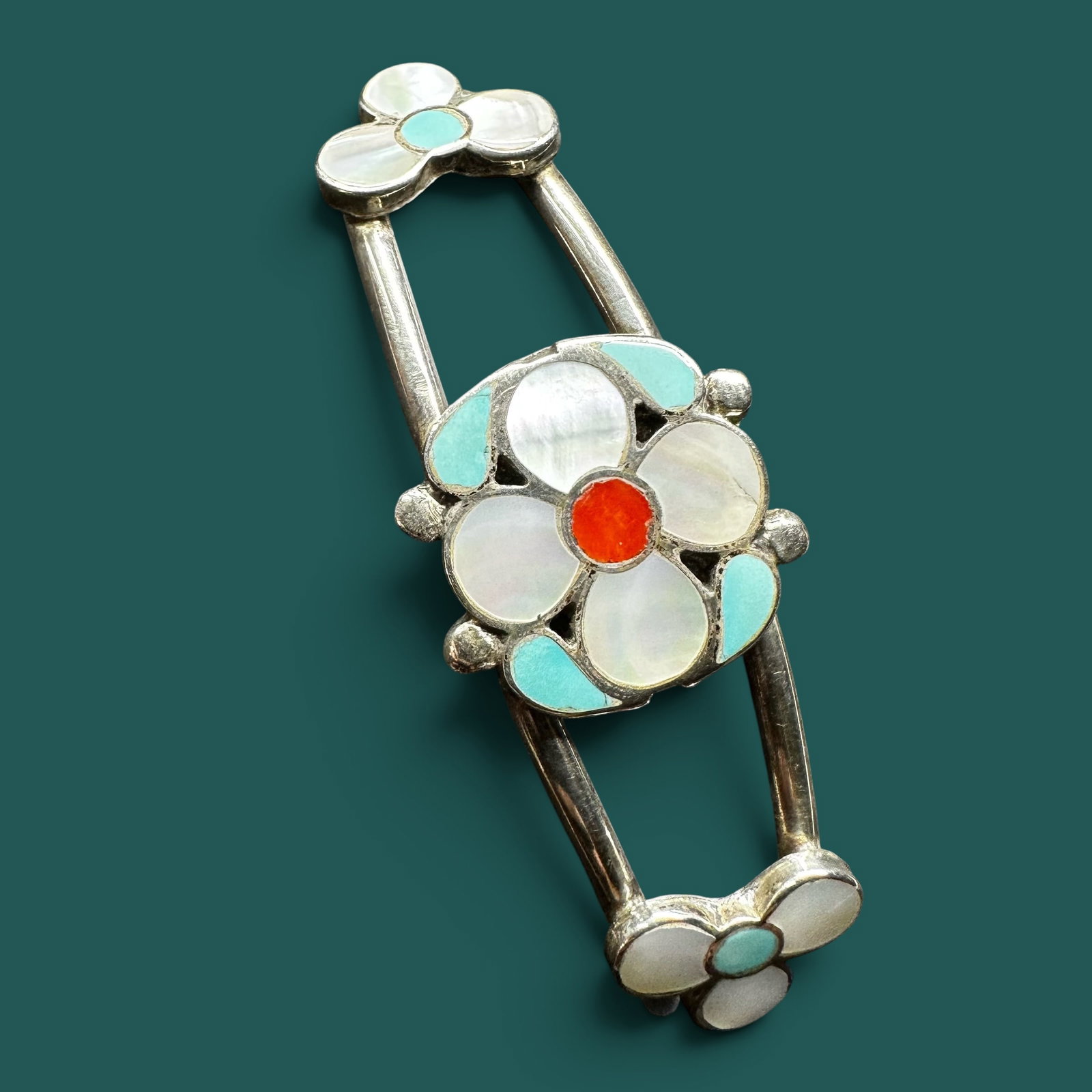6.5"/12g Winnie Shephard Sterling Silver Multi-Stone Floral Inlay Cuff Bracelet: 6.5"/12g Winnie L. Zephyr Sterling Silver Multi-Stone Floral Inlay Cuff BraceletBrand/Model: Signed “Winnie L. Zephyr.”Zuni Pueblo artisan. Manufacturer Location: Zuni Pueblo, New Mexico.Year 