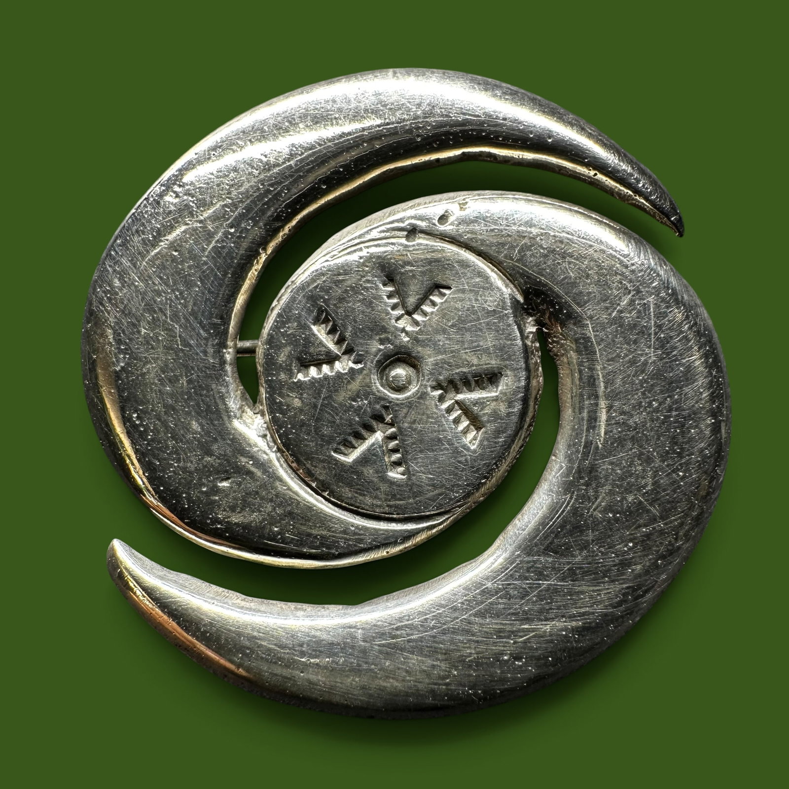 8g Southwestern Sterling Silver Spiral Brooch: 8g Southwestern Sterling Silver Spiral BroochBrand/Model: Unidentified artisan. Engraved/Hallmarked; “SX.”Manufacturer Location: Not marked.Year Produced: Unknown.Specs/Description: Vintage So