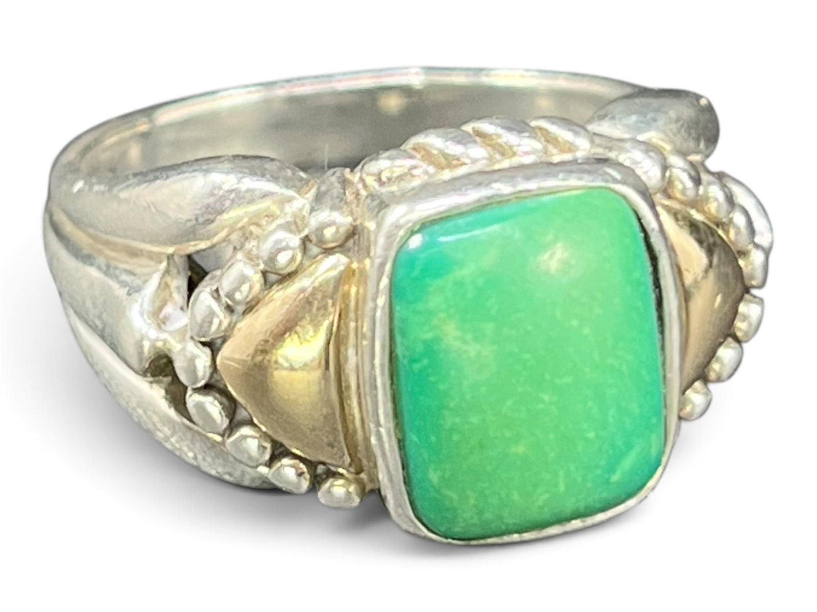 Sz7/8g Sterling Silver & 14K Gold Southwestern Green Turquoise Cabochon Cocktail Ring: Sz7/8g Sterling Silver & 14K Gold Southwestern Green Turquoise Cabochon Cocktail Ring. A substantial two-tone cocktail ring featuring a rectangular cushion-cut turquoise cabochon set in a sterling sil