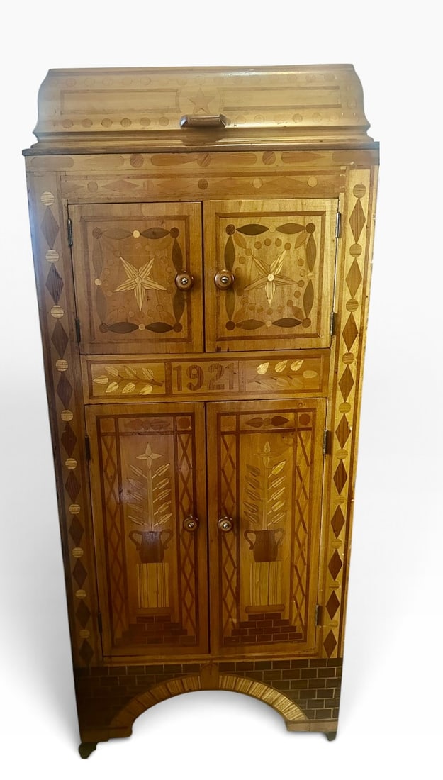 1921 Folk Art Marquetry Upright Hand-Crank Phonograph Cabinet: Unusual handmade upright phonograph cabinet dated 1921. Covered with detailed wood inlay designs including stars, flowers, vases and geometric patterns. The hand-crank phonograph mechanism, turntable 