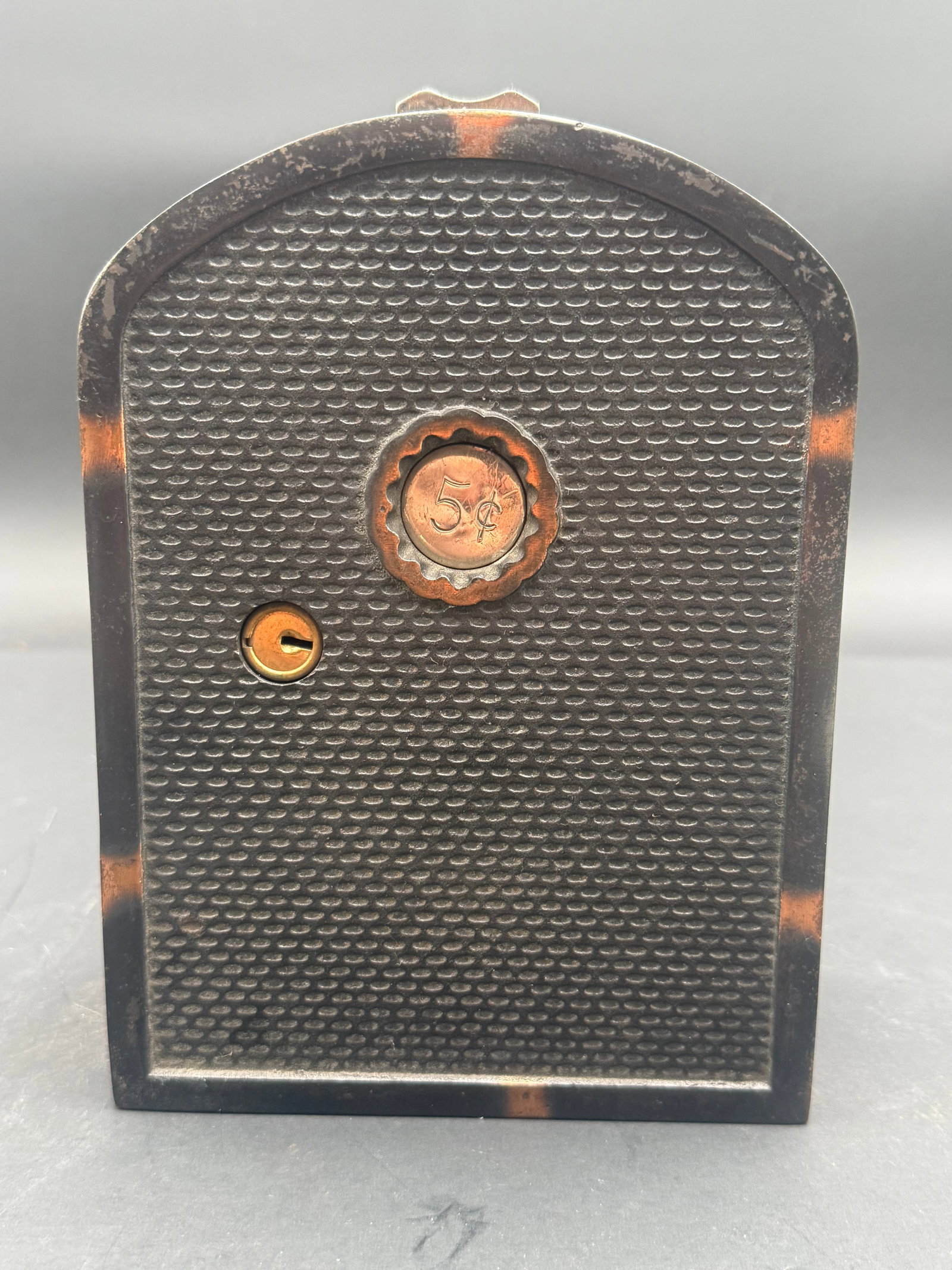 Vintage surface-mounted coin-operated lock mechanism (1 of 8)