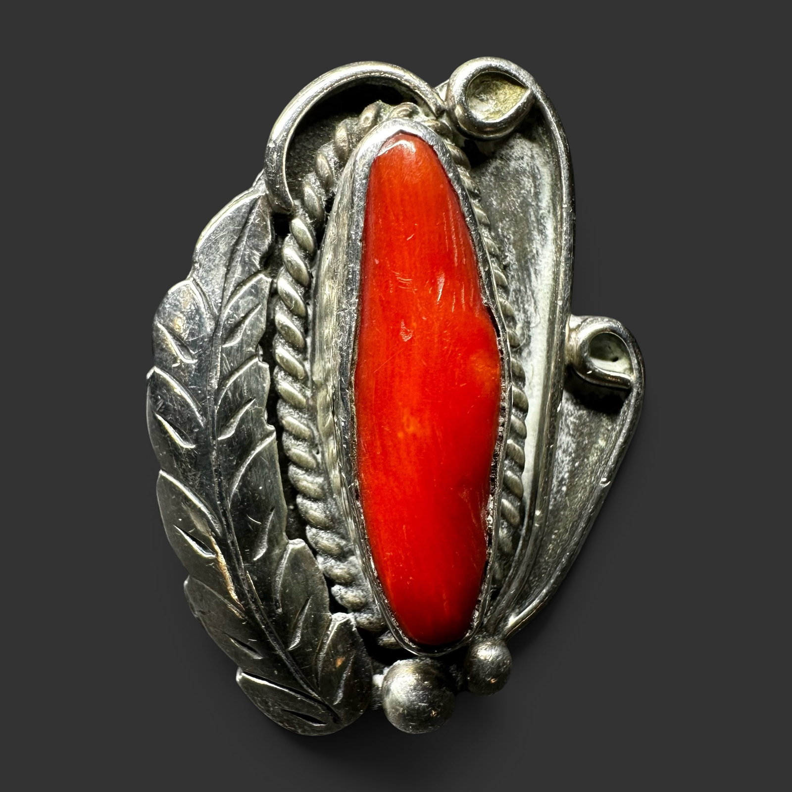 Sz5.5/9g Navajo (Diné) Sterling Silver Coral Ring: Sz5.5/9g Sz5.5/9g Navajo (Diné) Sterling Silver Coral Ring:Brand/Model: Hallmarked with an unidentified script signature. Unidentified artisan/shop.Manufacturer Location: Not marked.Year Produced: Un