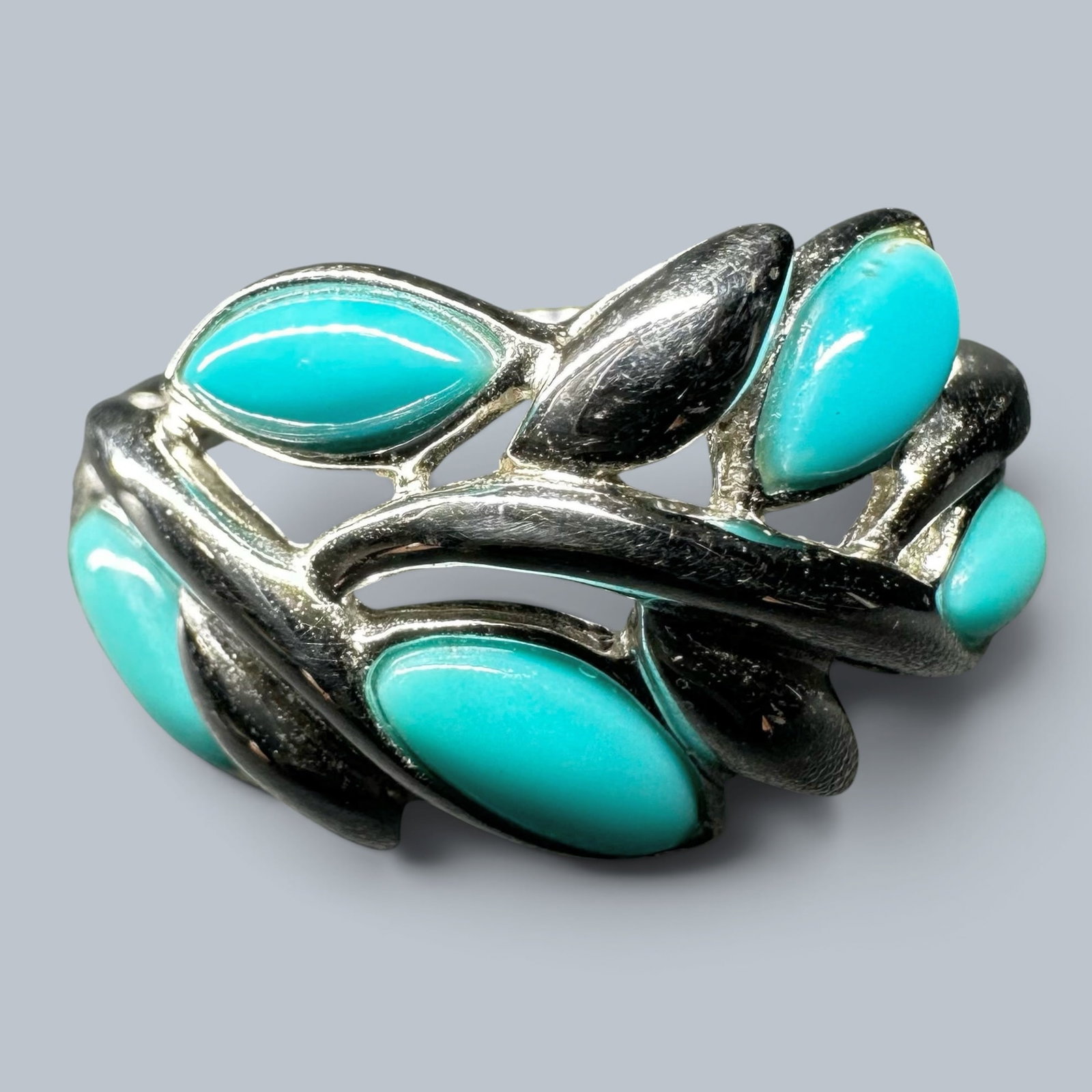 Sz7/3g 925 Sterling Silver Turquoise Leaf Ring:: Sz7/3g 925 Sterling Silver Turquoise Leaf Ring:Brand/Model: Hallmarked "EA" within an oval cartouche. EA designer/manufacturer mark associated with mass-distributed jewelry.Manufacturer Location: Not 