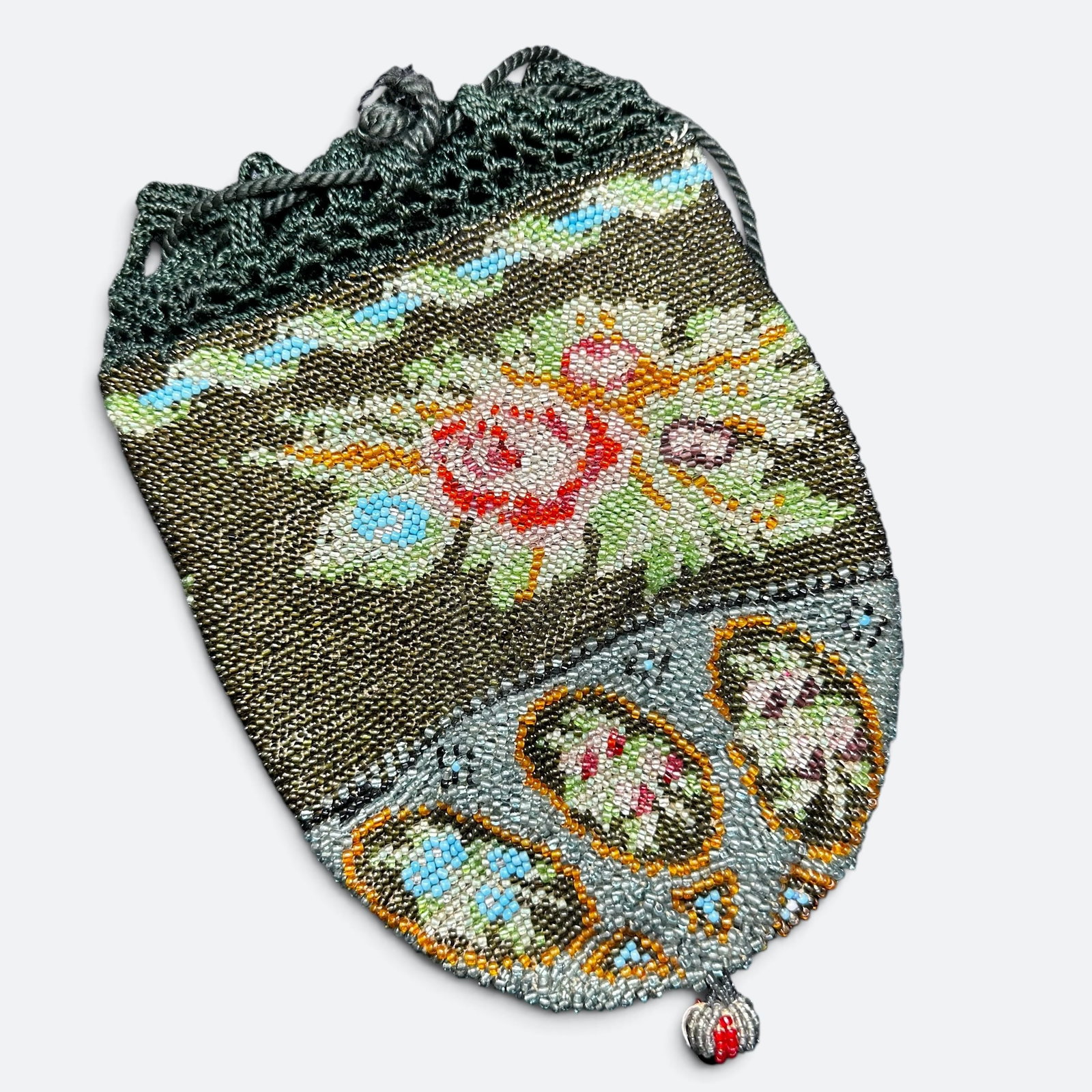 Vintage Micro Beaded Floral Drawstring Purse: Vintage Micro Beaded Floral Drawstring Purse:Brand/Model: No hallmark. Unidentified artisan/shop.Manufacturer Location: Not marked.Year Produced: Early to mid-20th century.Specs/Description: Vintage m
