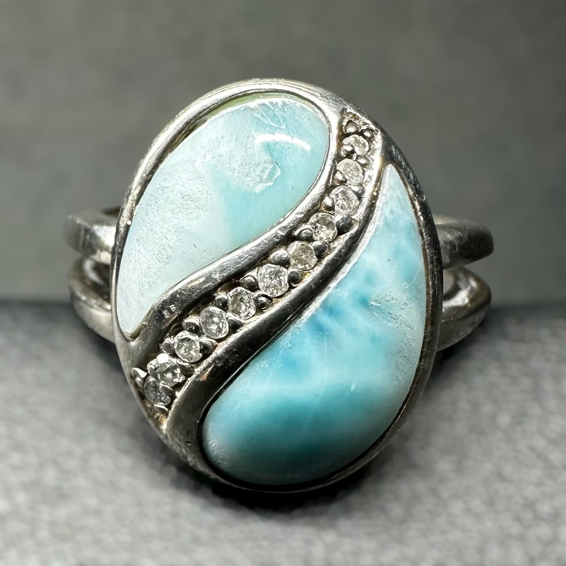 Sz7/7g 925 Sterling Silver Larimar Cubic Zirconia Yin-Yang Bypass Ring: Sz7/7g 925 Sterling Silver Larimar Cubic Zirconia Yin-Yang Bypass Ring:Brand/Model: No hallmark. Unidentified artisan/shop.Manufacturer Location: Not marked.Year Produced: Contemporary.Specs/Descripti