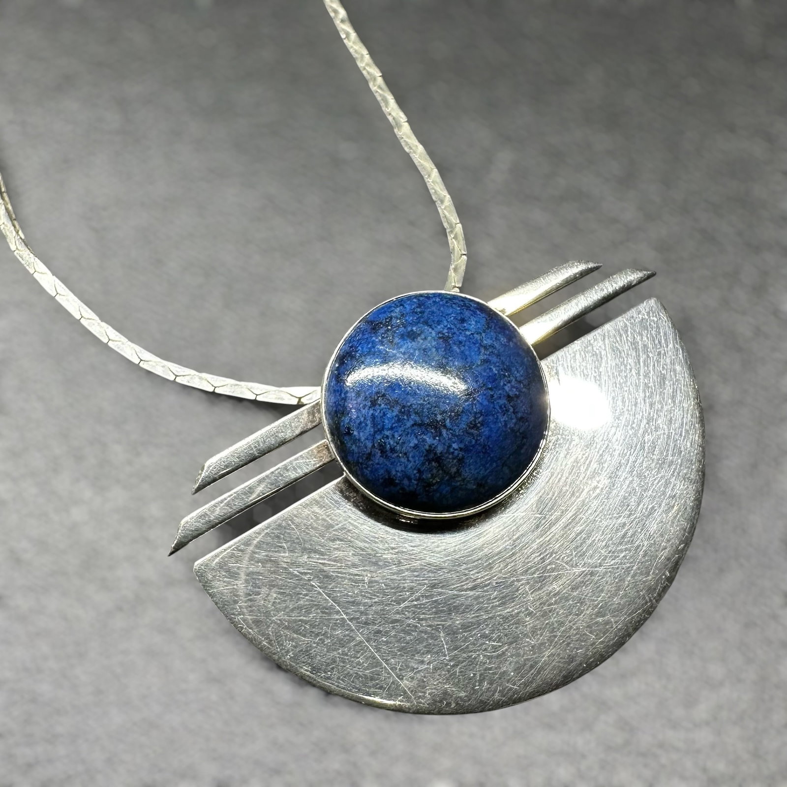 17"/12g Modernist Southwestern Sterling Silver Lapis Lazuli Pendant Necklace: 17"/12g Modernist Southwestern Sterling Silver Lapis Lazuli Pendant Necklace:Brand/Model: No hallmark. Unidentified artisan/shop.Manufacturer Location: Not marked. Chain marked Italy.Year Produced: Un