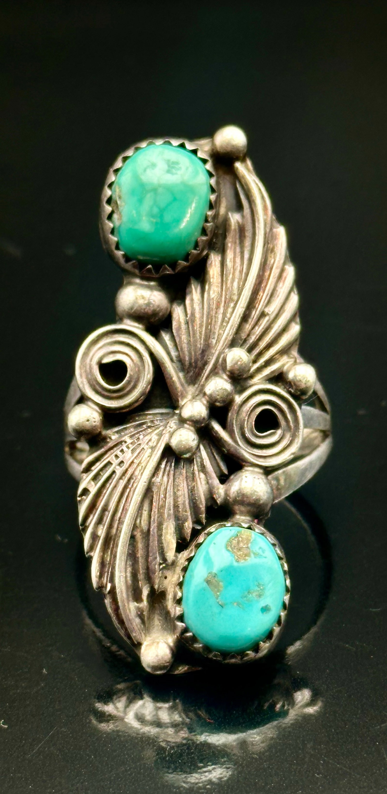 8g Running Bear 925 Sterling Silver Turquoise Leaf Ring: Vintage sterling silver ring with two turquoise stones, detailed leaves, silver beads and scrollwork. Marked R.B. inside a bear with 925 for Running Bear Trading. Natural matrix in the turquoise with 