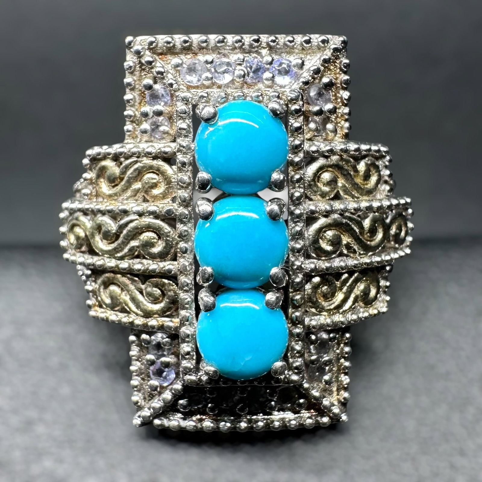 Sz7.25/7g 925 Sterling Silver Turquoise Cubic Zirconia Ring: Sz7.25/7g 925 Sterling Silver Turquoise Cubic Zirconia Ring:Brand/Model: No hallmark. Unidentified artisan/shop.Manufacturer Location: Not marked.Year Produced: Unknown.Specs/Description: Southwestern