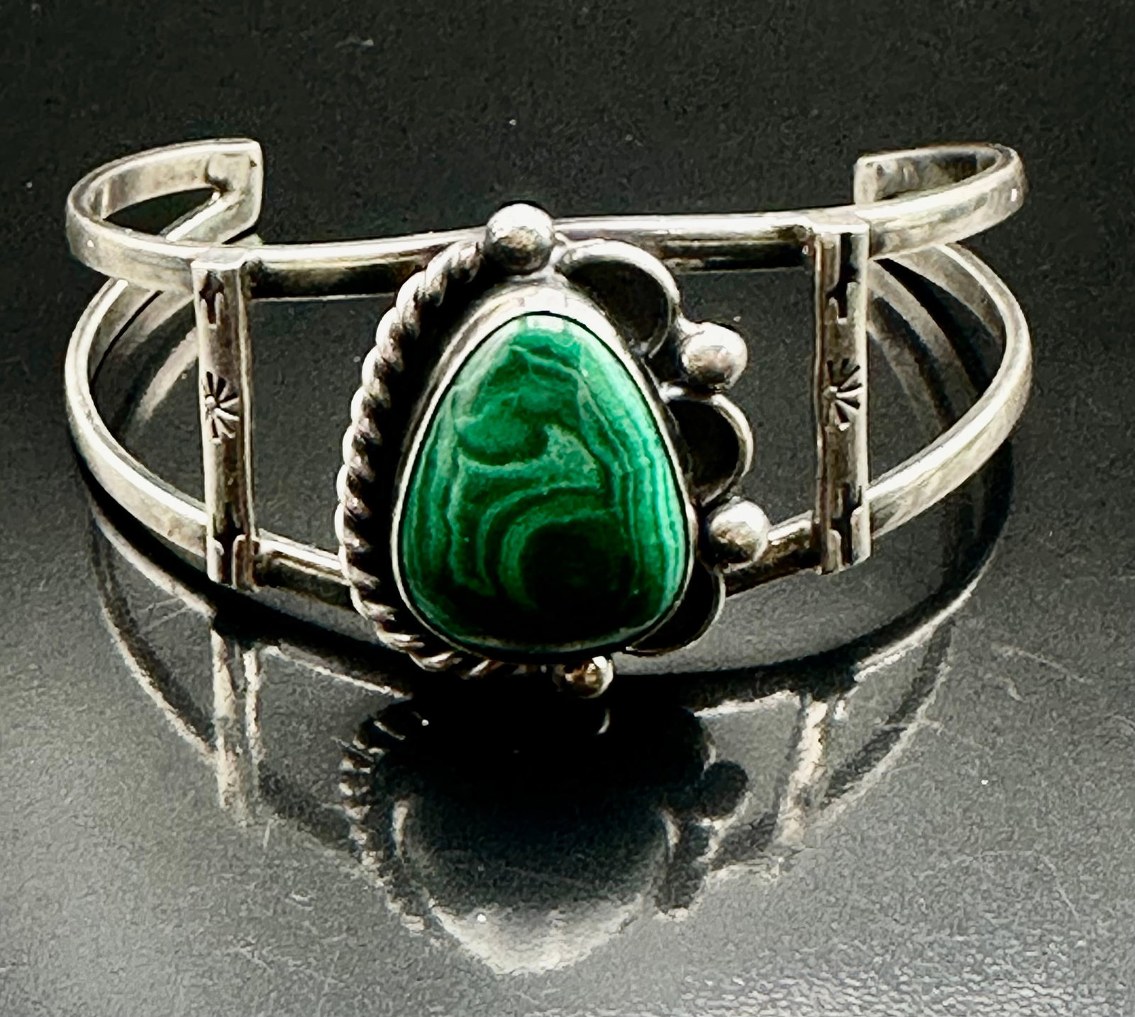 21g Rose Lincoln Navajo Sterling Silver Malachite Cuff Bracelet: Vintage Navajo sterling silver cuff bracelet by Rose Lincoln. Features a teardrop-shaped malachite stone with rope, silver bead and hand-stamped details. Signed RL.