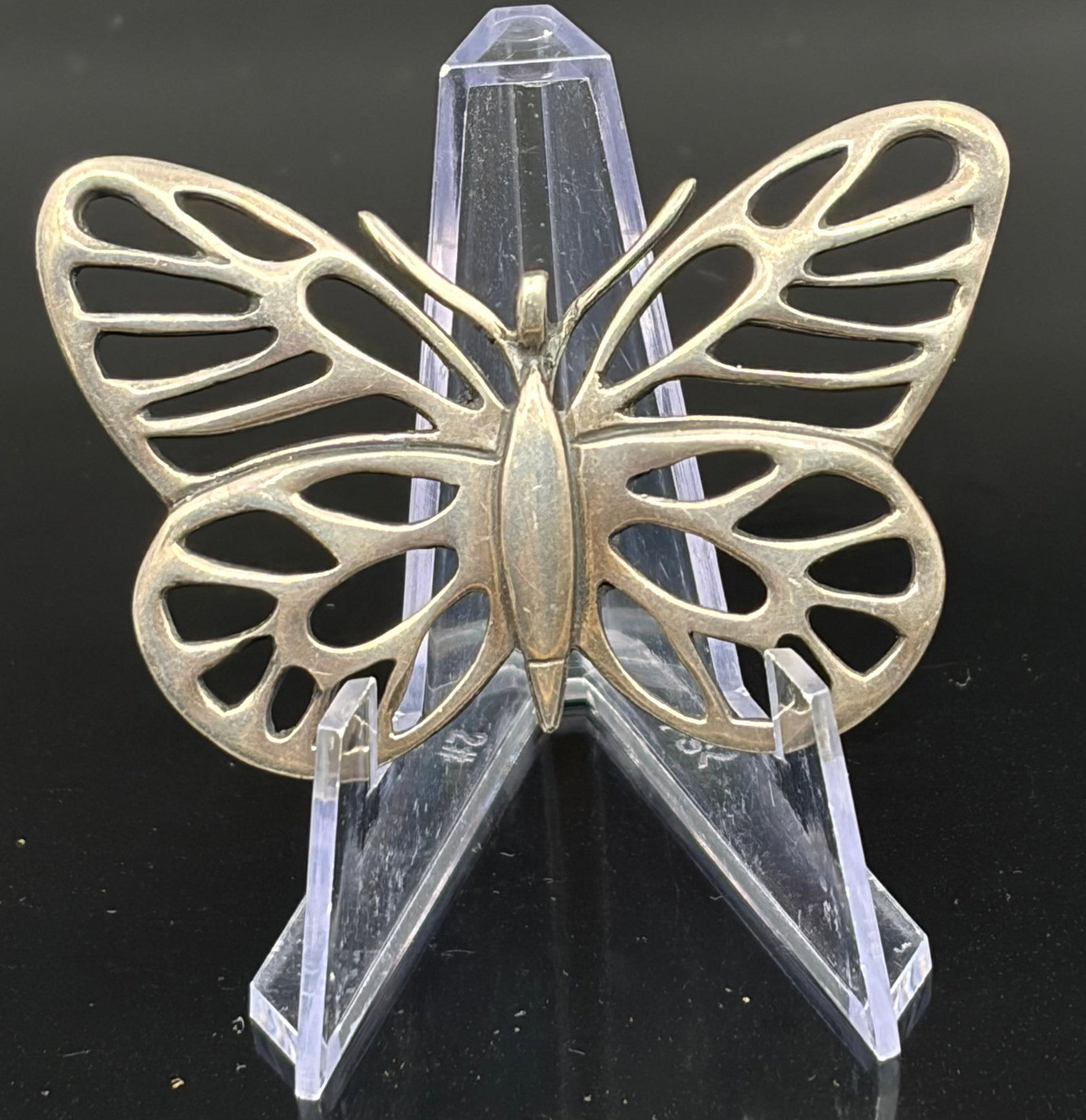 10.8 g Vintage Neiman Marcus Signed H&H Sterling Silver Openwork Butterfly Pendant: Reticulated openwork butterfly featuring symmetric cutouts on the wings, a sleek polished central body, and realistic antenna lines. It includes a integrated vertical bale loop at the top apex for a n