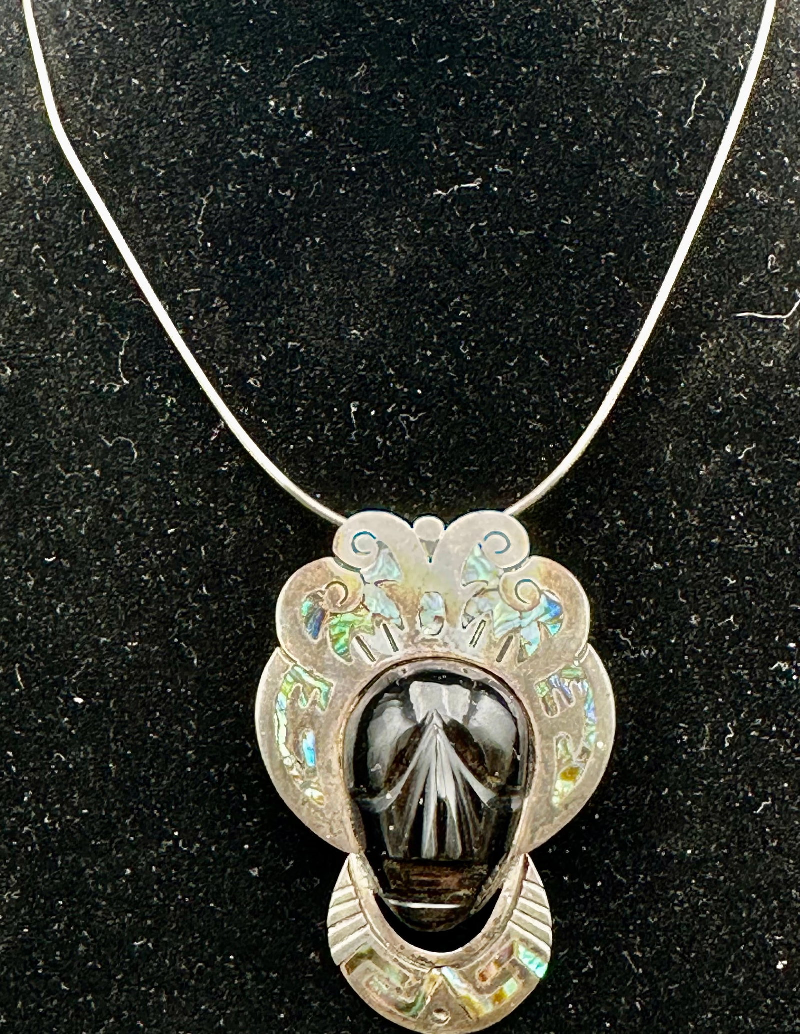 37g Vintage Taxco Mexico 925 Silver Abalone Aztec Mask Necklace: Vintage Taxco Mexico sterling silver necklace with a carved black stone Aztec mask and colorful abalone inlay. The pendant can also be worn as a brooch. Marked “Hecho en Mexico,” “925,&rdquo