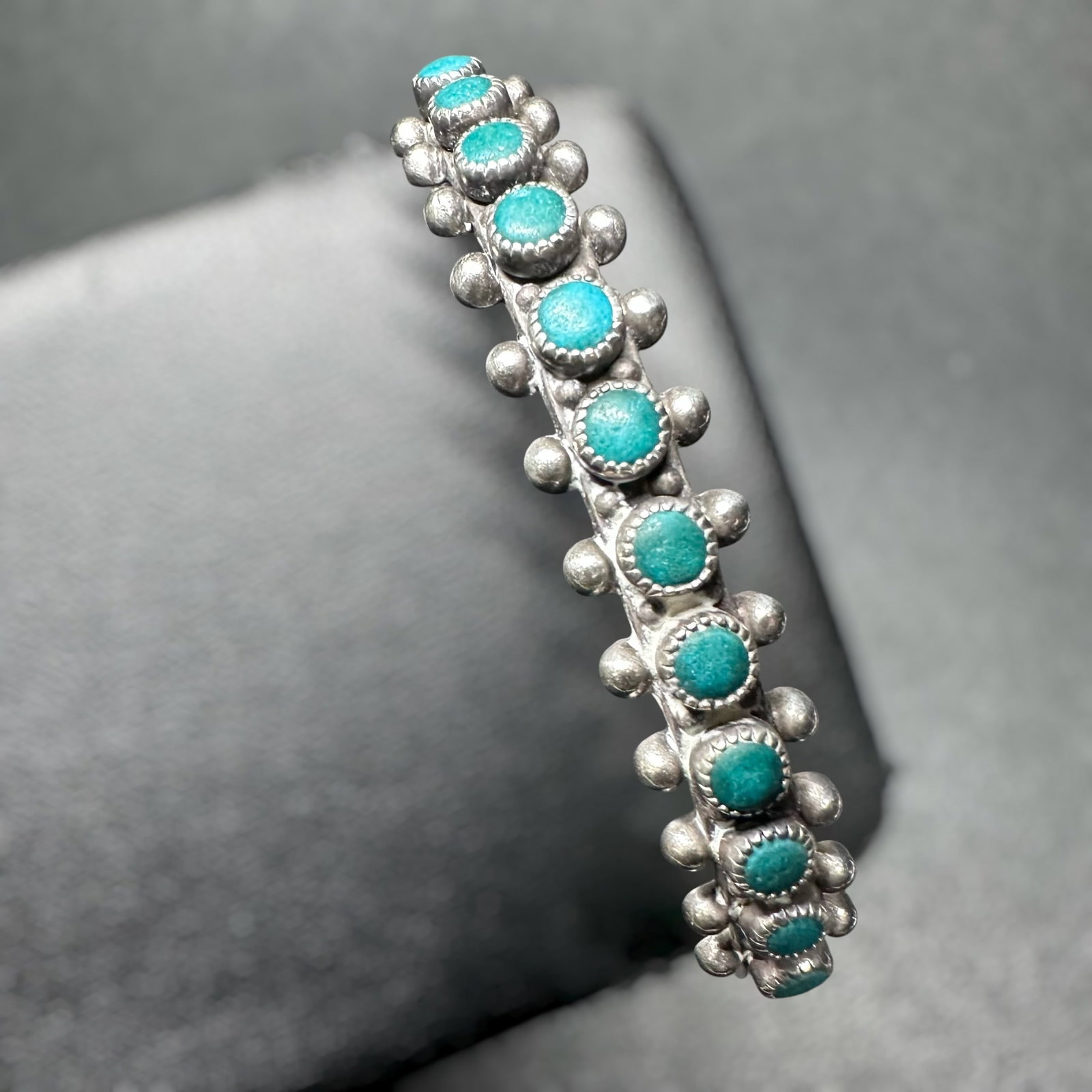 6.25"/14g Zuni Sterling Silver Petit Point Turquoise Cuff Bracelet: 6.25"/14g Zuni Sterling Silver Petit Point Turquoise Cuff Bracelet:Brand/Model: No hallmark. Unidentified Zuni artisan.Manufacturer Location: Zuni Pueblo, New Mexico.Year Produced: Circa mid-to-late 2