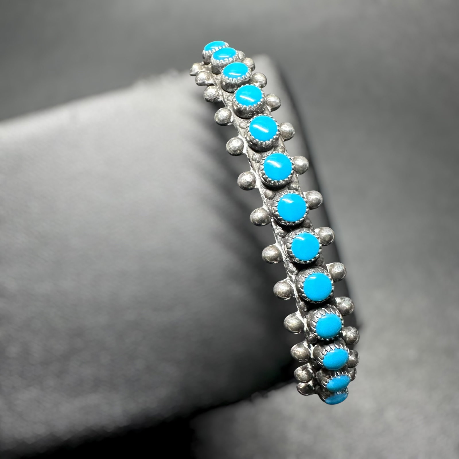 6.5"/12g Zuni Sterling Silver Petit Point Turquoise Cuff Bracelet: 6.5"/12g Zuni Sterling Silver Petit Point Turquoise Cuff Bracelet:Brand/Model: No hallmark. Unidentified Zuni artisan.Manufacturer Location: Zuni Pueblo, New Mexico.Year Produced: Circa mid-to-late 20