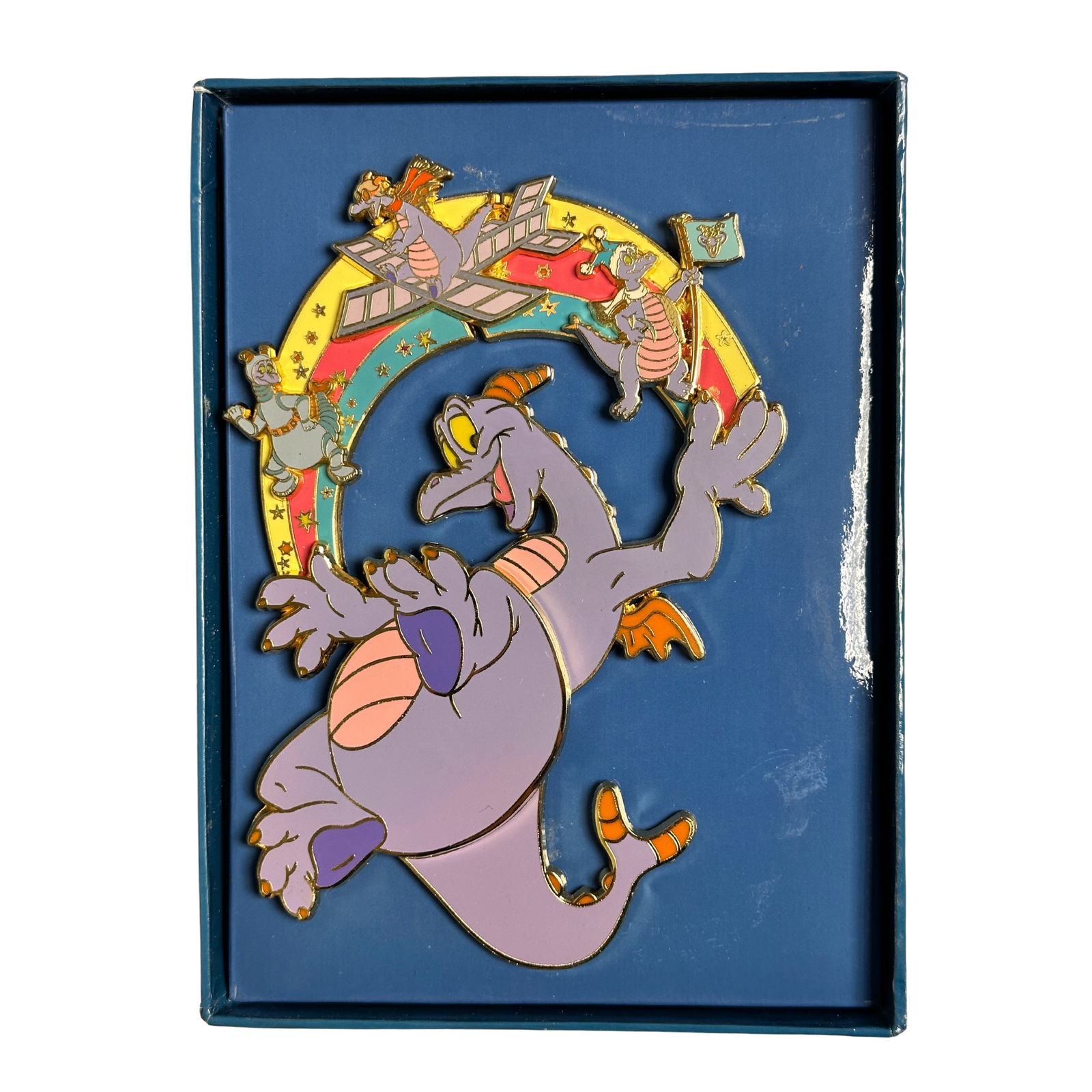 Disney A Family Pin Gathering Epcot Figment Jumbo Pin LE 300: A Walt Disney Epcot Figment Pin. This jumbo pin features Figment holding up a rainbow with 3 smaller versions on figment on it. It is limited to 300. The pin measures 5.5" tall and 4" wide.
