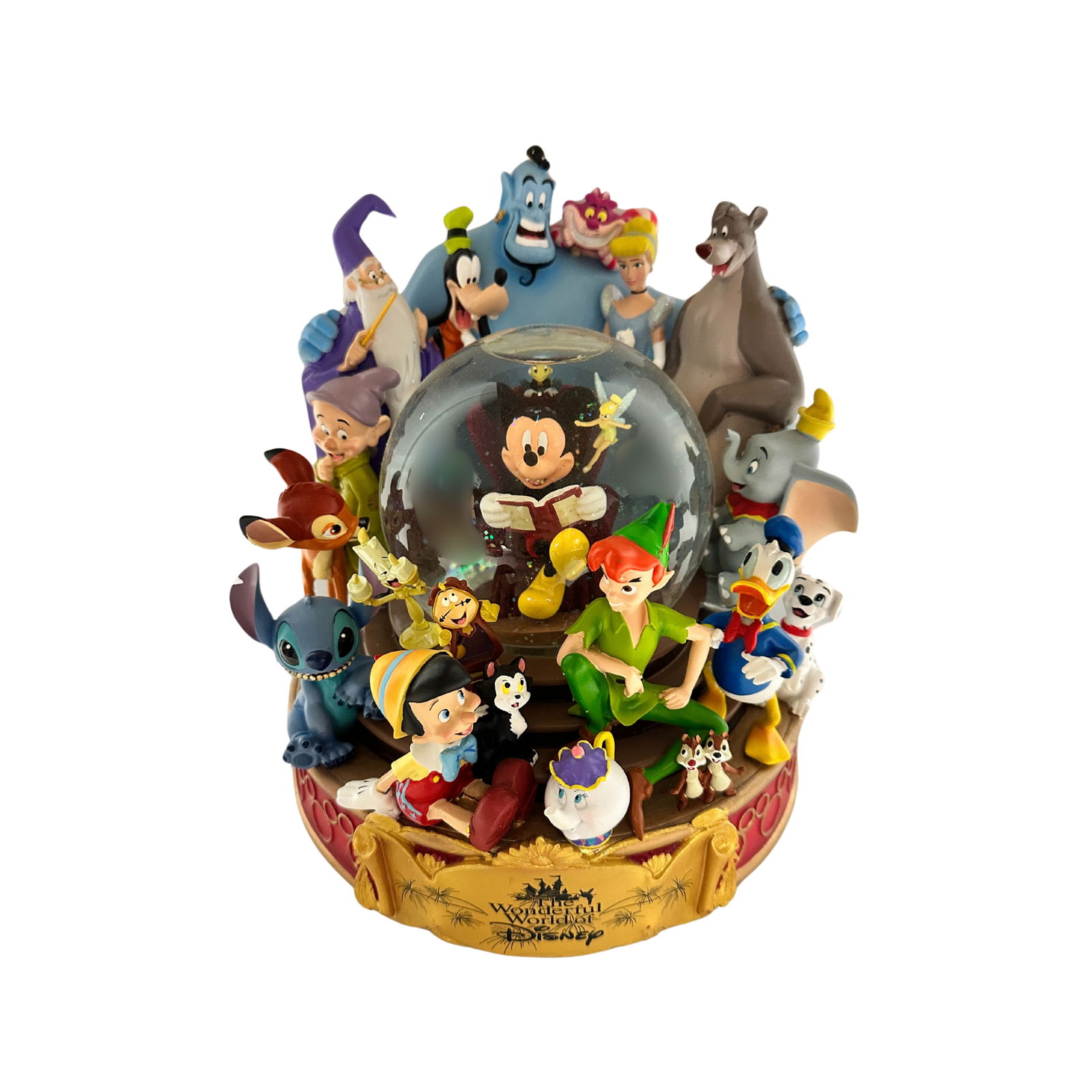 Disney Store Wonderful World Of Disney Musical Snow Globe: A Wonderful World of Disney musical snow globe. This piece features Mickey, Tinker Bell, Jiminy Cricket, Genie, Cheshire Cat, Cinderella, Baloo, Dumbo, Freckles, Donald, Chip & Dale, Petter Pan, Ms. P