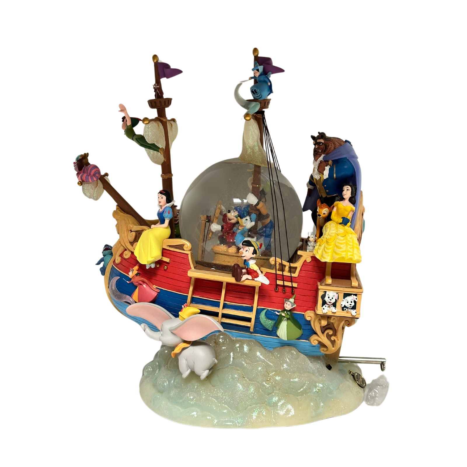 Disney Store World Of Disney Magical Gathering Musical Snow Globe: A World Of Disney magical gathering musical snow globe. This piece features Mickey, Donald, Goofy, Pinocchio, Cheshire Cat, Peter Pan, Dumbo, Snow White, Belle, Jasmine, Aladdin, Genie, and More. It m