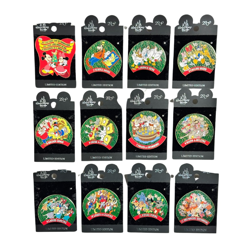 Disney 12 Days Of Christmas Pin Set Of 12: A Disney 12 Days Of Christmas Pin Set Of 12. These Mickey, Minnie, Princesses, Goofy, Seven Dwarfs, Donald, Daisy, and more.