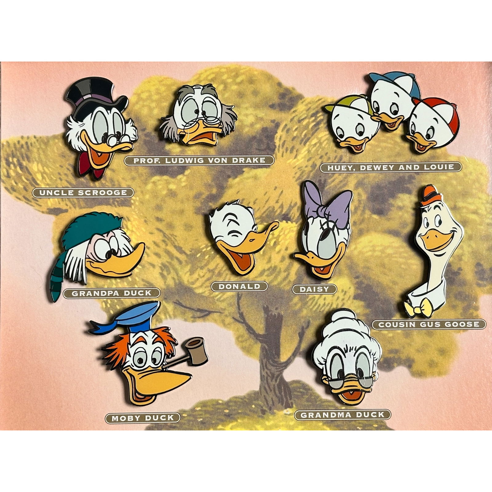 Disney Donald Duck My Family Tree Boxed Pin Set Of 9: Disney Donald Duck My Family Tree Boxed Pin Set Of 9. This piece features Huey, Dewey, Louie, Uncle Scrooge, Professor Ludwig, Grandpa Duck, Grandma Duck, Moby Duck, Cousin Gus Goose, Donald, and Dais