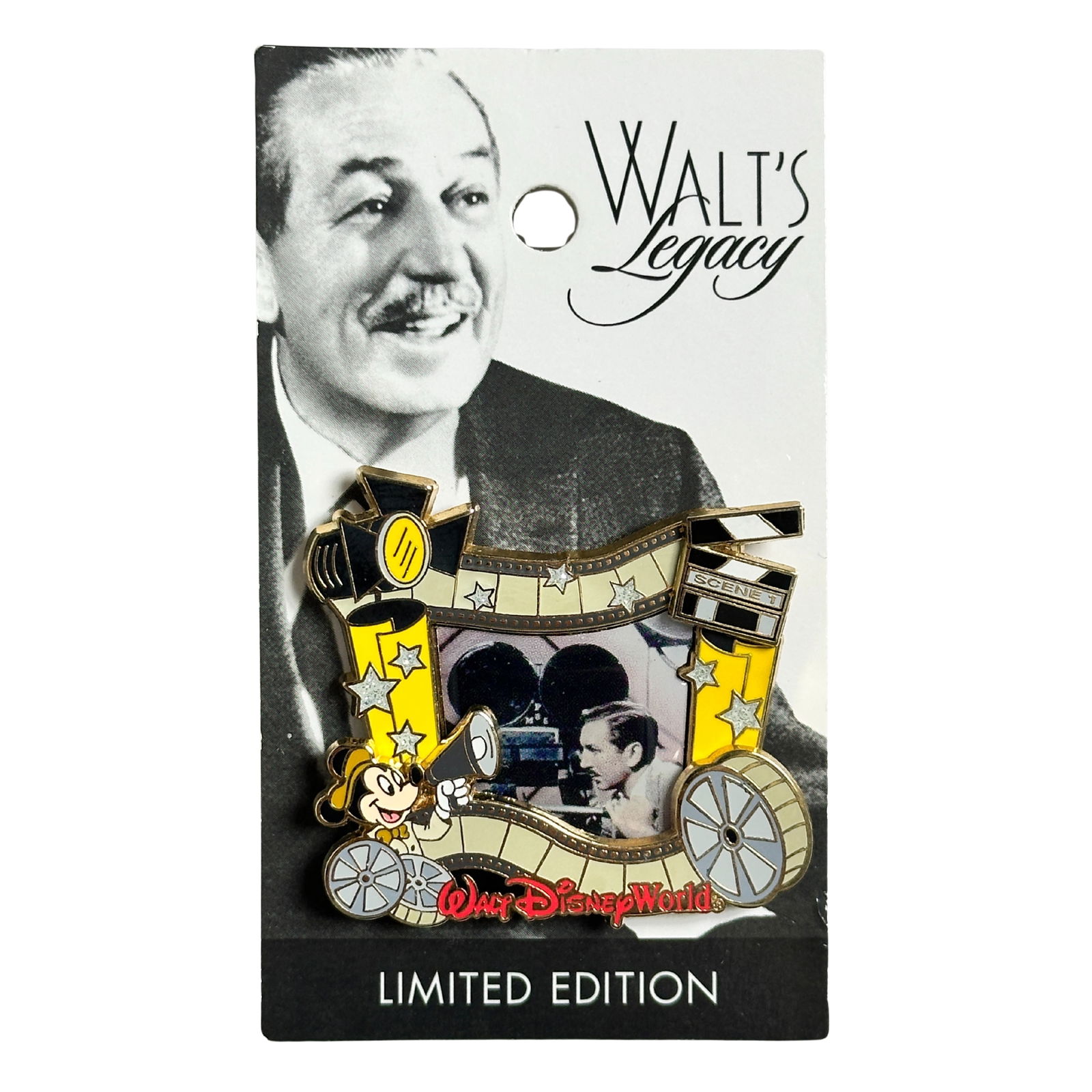 Disney WDW Walt's Legacy Live Action Film LE Pin: Disney WDW Walt's Legacy Live Action Film LE Pin. This features Mickey as a Director and a picture of Walt operating a camera.
