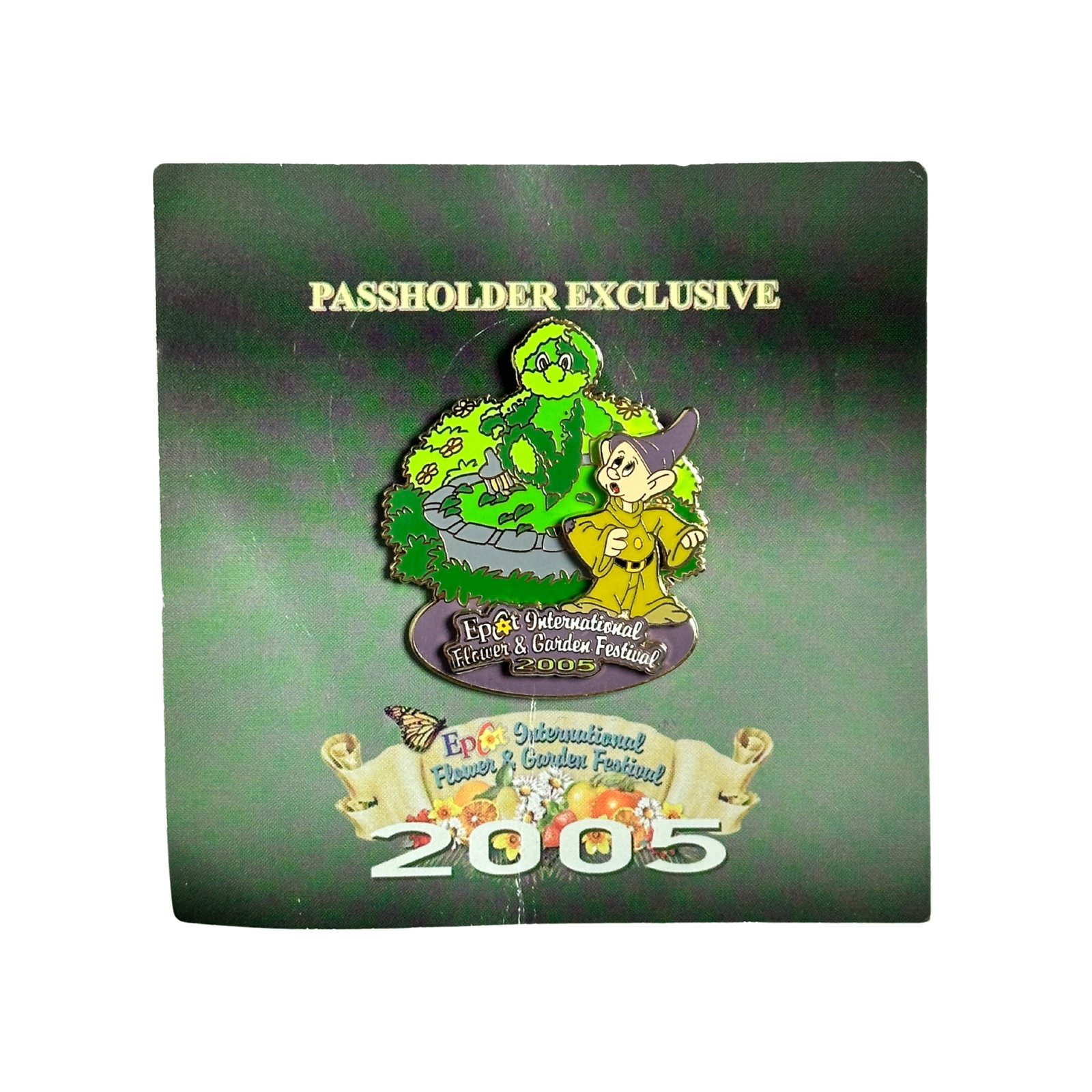 Disney Epcot International Flower And Garden Festival 2005 Dopey Passholder Pin: Disney Epcot International Flower And Garden Festival 2005 Dopey Passholder Pin. This features Dopey in front of a garden bush shaped like him.
