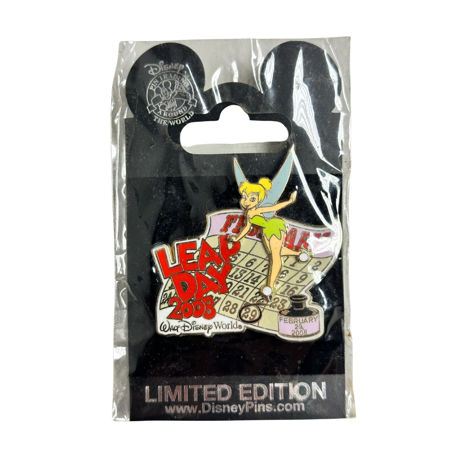 Disney WDW Leap Day 2008 Tinker Bell Pin: Disney WDW Leap Day 2008 Tinker Bell Pin. This features Tinker Bell in front of the February 2008 Callander.*****FREE SHIPPING********SELECT BUYER ARRANGED SHIPPING AT CHECKOUT*****