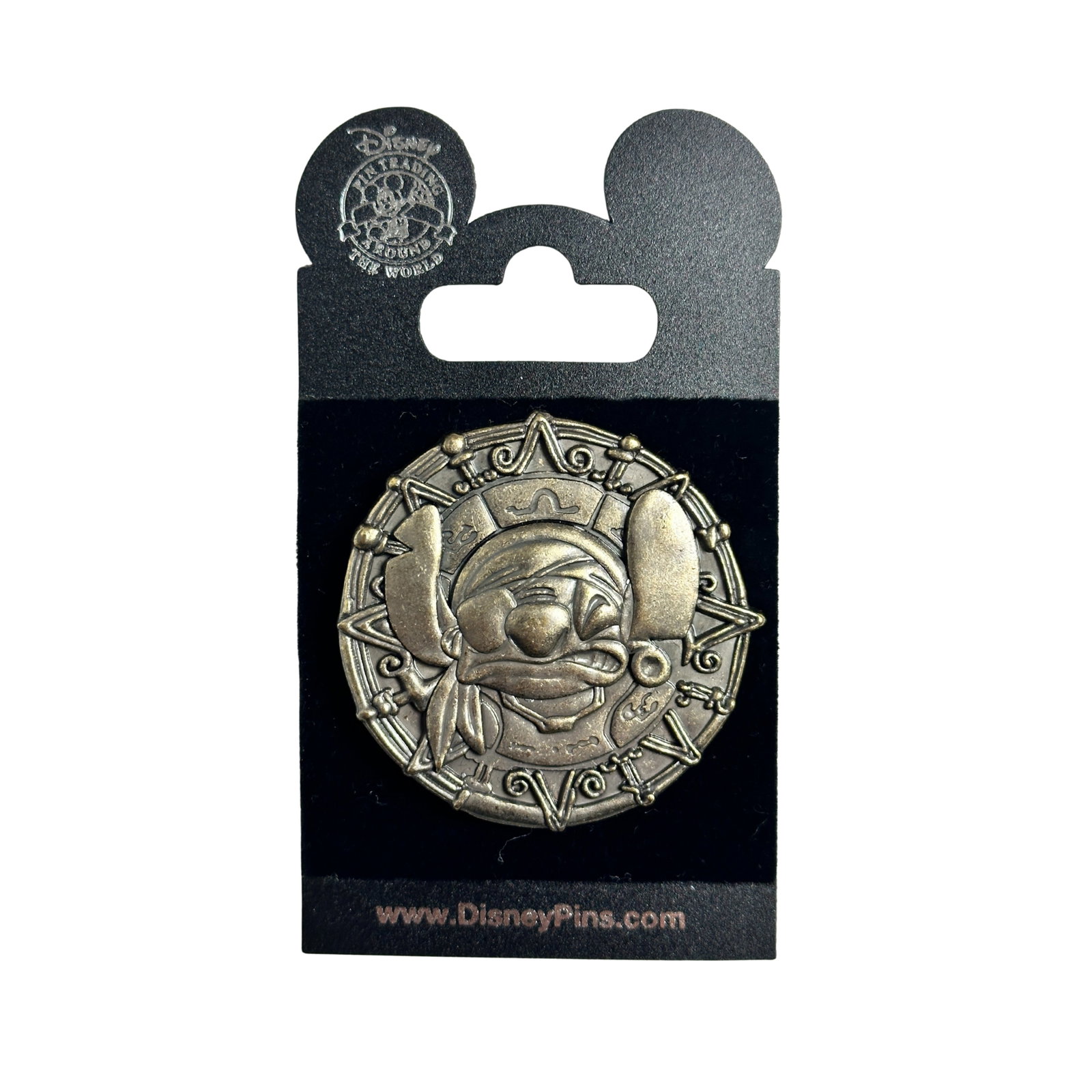 Disney WDW Pirates Of The Caribbean Stitch Coin Pin: Disney WDW Pirates Of The Caribbean Stitch Coin Pin. This pin features Pirate Stitch in the center of a sculpted-relief coin (medallion). Stitch appears to be angry. He is wearing an earring in his le