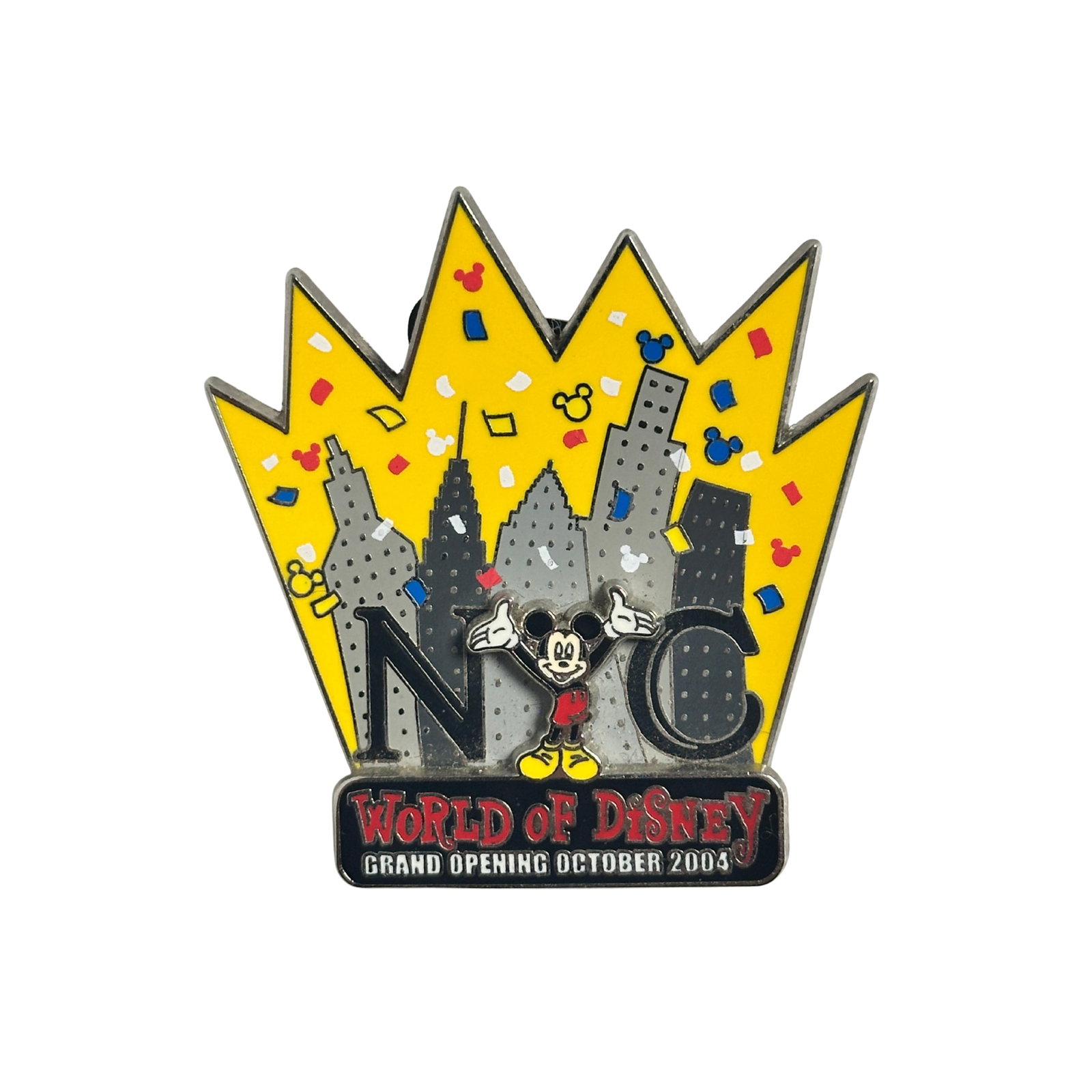 Disney NYC World Of Disney Grand Opening 2004 Pin: Disney NYC World Of Disney Grand Opening 2004 Pin. This features Mickey forming the Y in NYC. There is a yellow background with confetti and New York skyscrapers. The bottom of the pin reads "World of