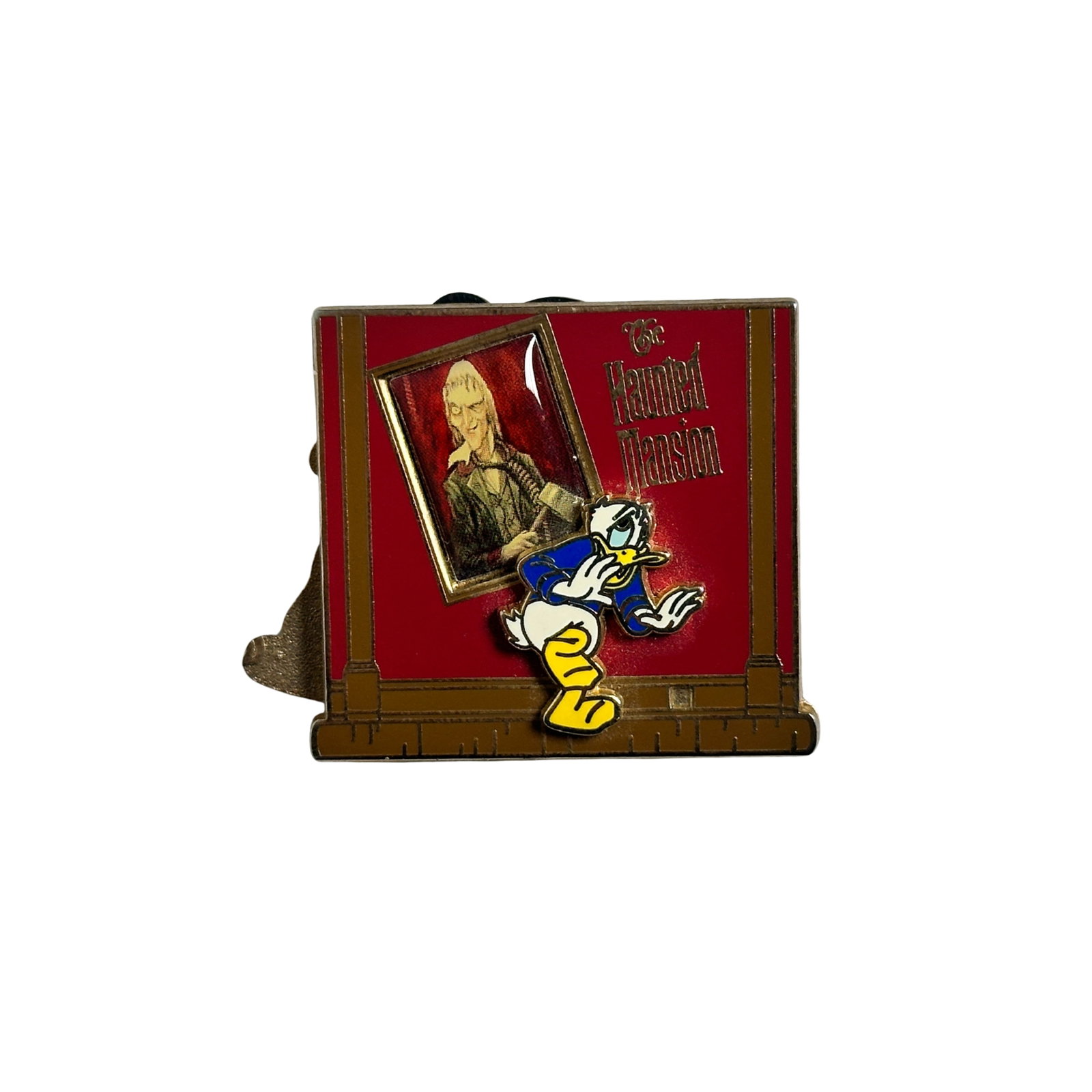 Disney WDW Haunted Mansion Donald, Mickey, Goofy, Pin: Disney WDW Haunted Mansion Donald, Mickey, Goofy, Pin. This pin is a double sided pin with Donald being scared by a picture in the Haunted Mansion on the front side. The back has Mickey and Goofy laug