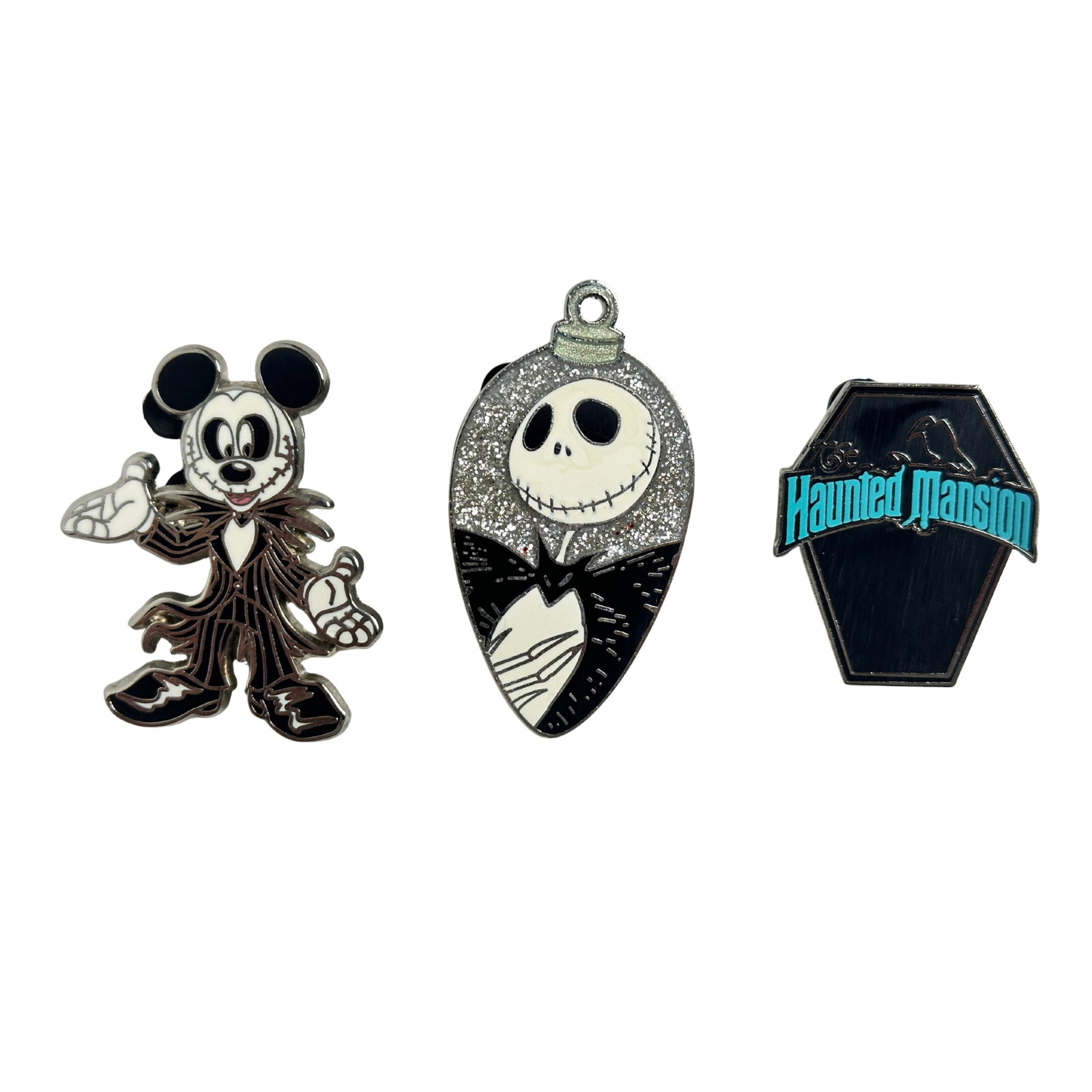 Disney WDW Nightmare Before Christmas & Haunted Mansion Assorted Pin Lot Of 3: Disney WDW Nightmare Before Christmas & Haunted Mansion Assorted Pin Lot Of 3. This features Mickey as Jack Skellington, Jack himself on a silver sparkly Christmas ornament, and a black casket with th