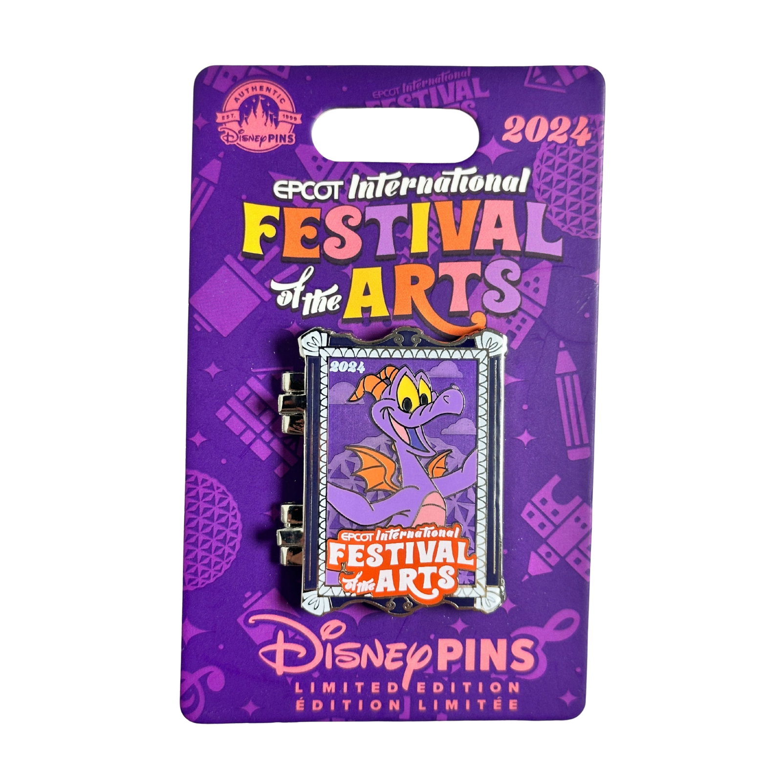 Disney WDW Epcot International Festival Of The Arts Figment The Dragon Pin: Disney WDW Epcot International Festival Of The Arts Figment The Dragon Pin. This hinged pin resembles a framed work of art featuring Figment against a purple background. The background includes subtle