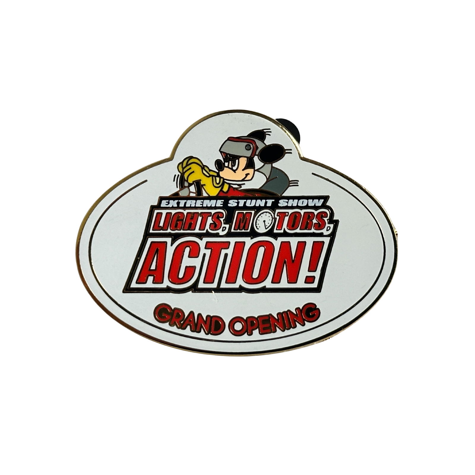 Disney WDW Lights, Motors, Action! Mickey Grand Opening Pin: Disney WDW Lights, Motors, Action! Mickey Grand Opening Pin. This Cast pin is in the shape of a name tag. It has the working "Extreme Stunt Show" then "Lights, Motors, Action!" in the middle. On the b