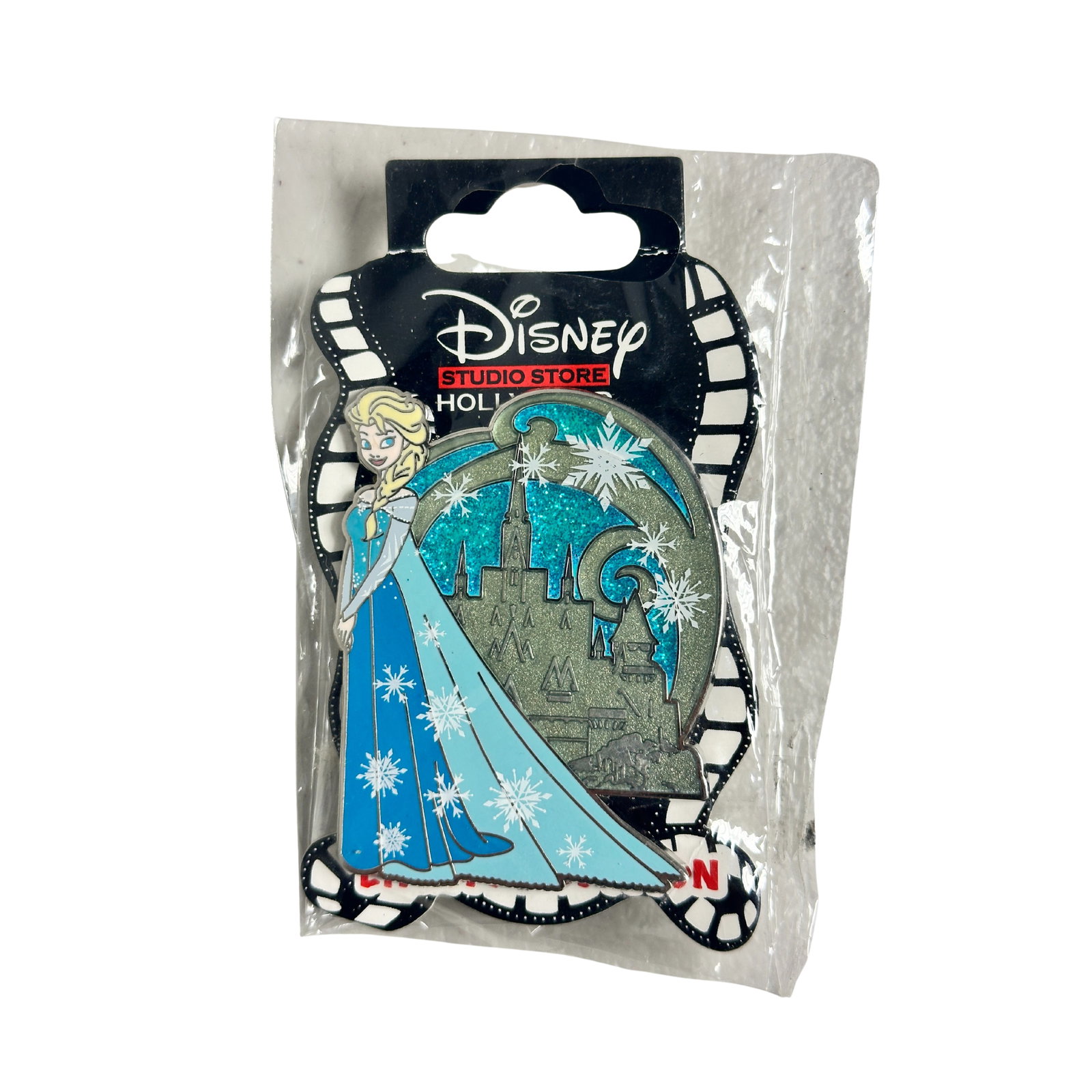 Disney DSSH Soda Fountain Frozen Elsa LE Pin: Disney DSSH Soda Fountain Frozen Elsa LE Pin. This DSSH Ghirardelli Soda Fountain jumbo pin features Elsa from Disney's blockbuster film "Frozen." She's in her typical pose with hands clasped while st
